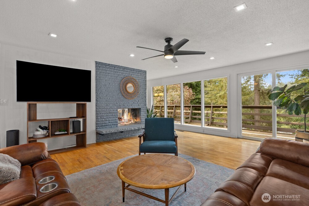 framed by floor-to-ceiling windows.