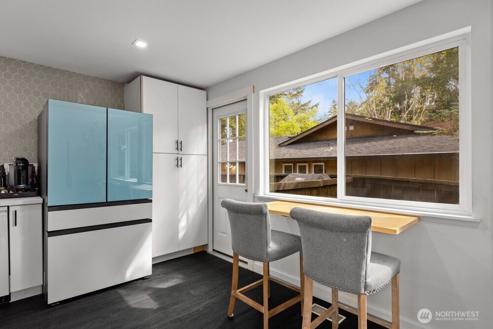 With an eat-in bar, this  kitchen is both stylish and functional.