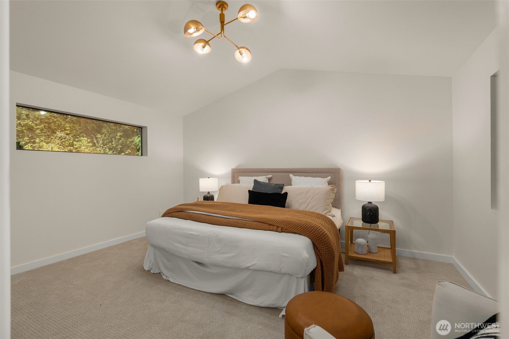 Primary Suite w/ vaulted ceilings and views to front and backyards