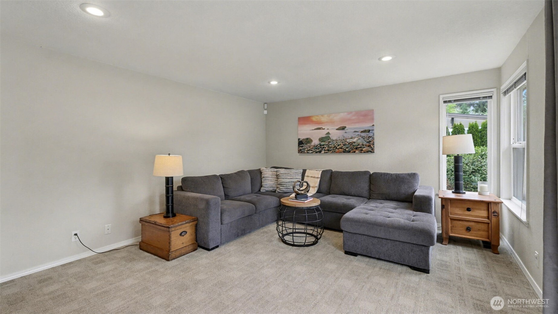 Family room off the kitchen, and the rest of the home, stays cozy thanks to the new furnace.