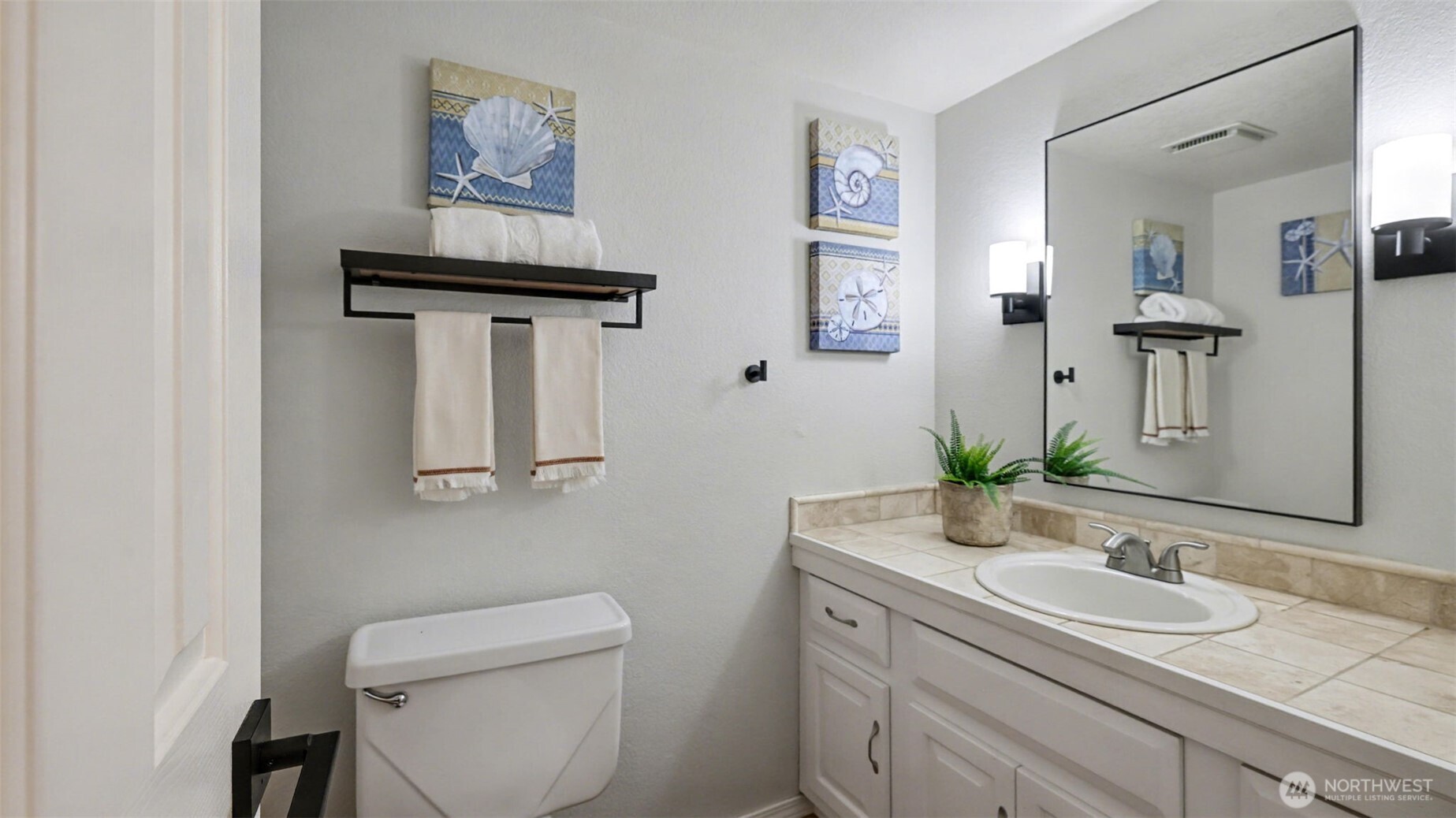 Large downstairs powder room.