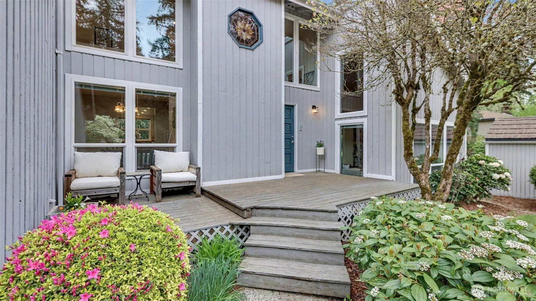 A large porch welcomes you into this home.