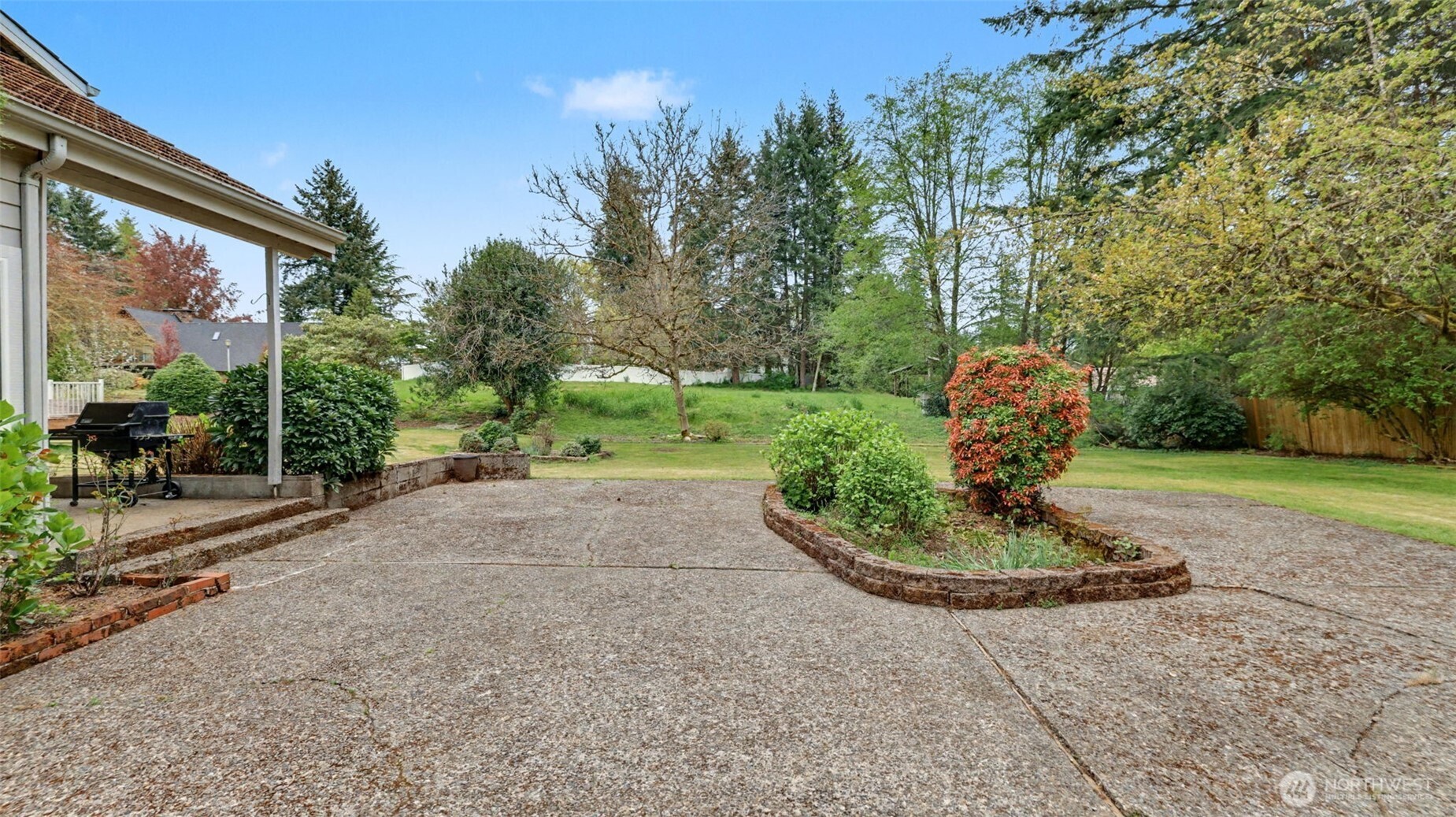 Large open patio space for entertaining or play.