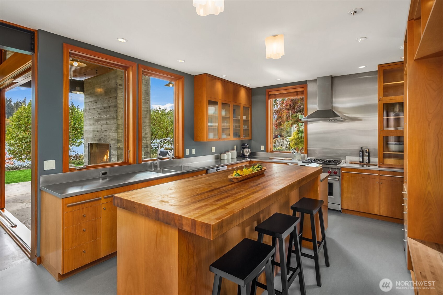 Gather at the wood-topped center island.