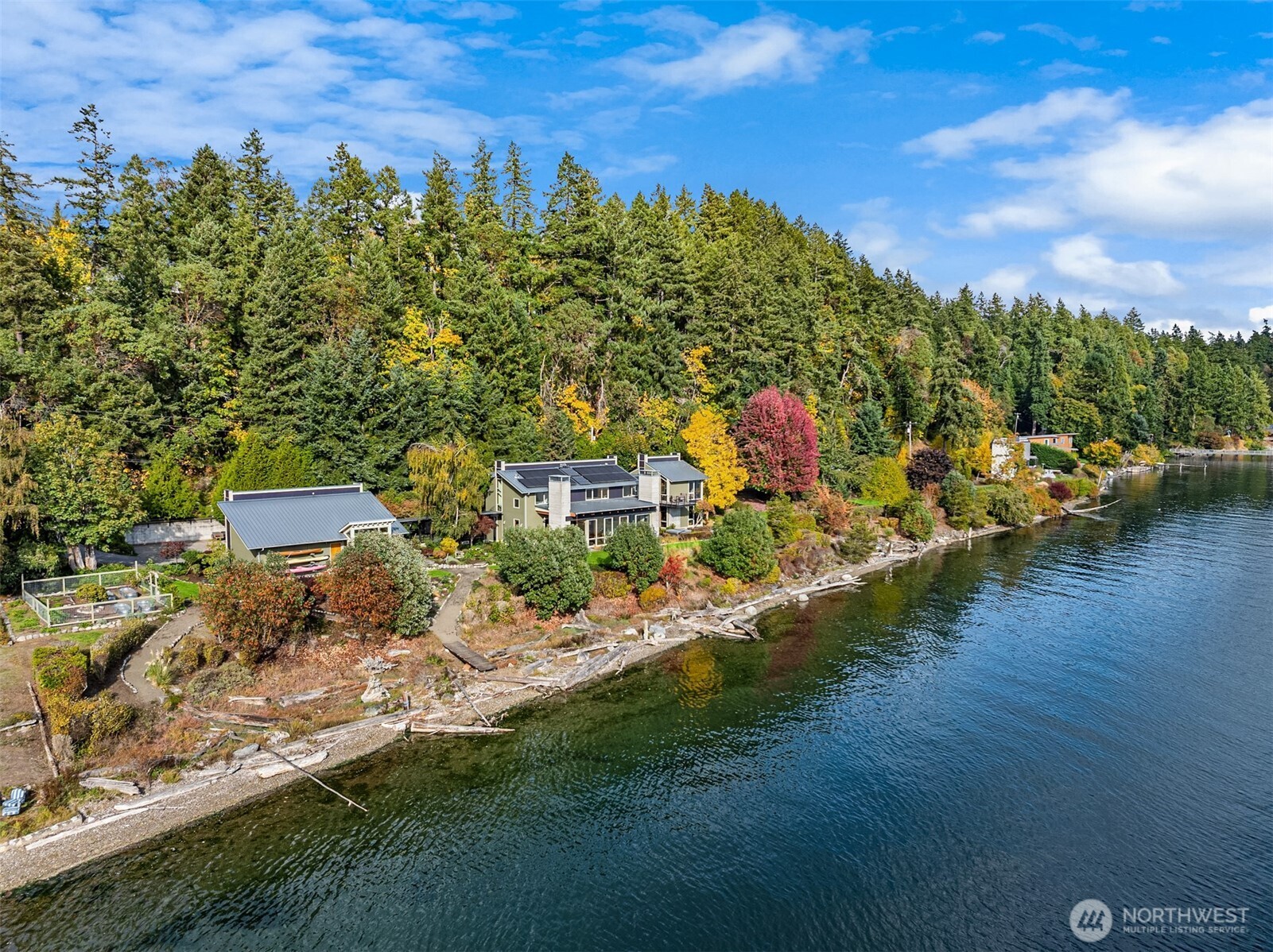 The shy-acre waterfront property is just moments from Blakely Harbor Park, Fort Ward, and miles of scenic south-end trails.