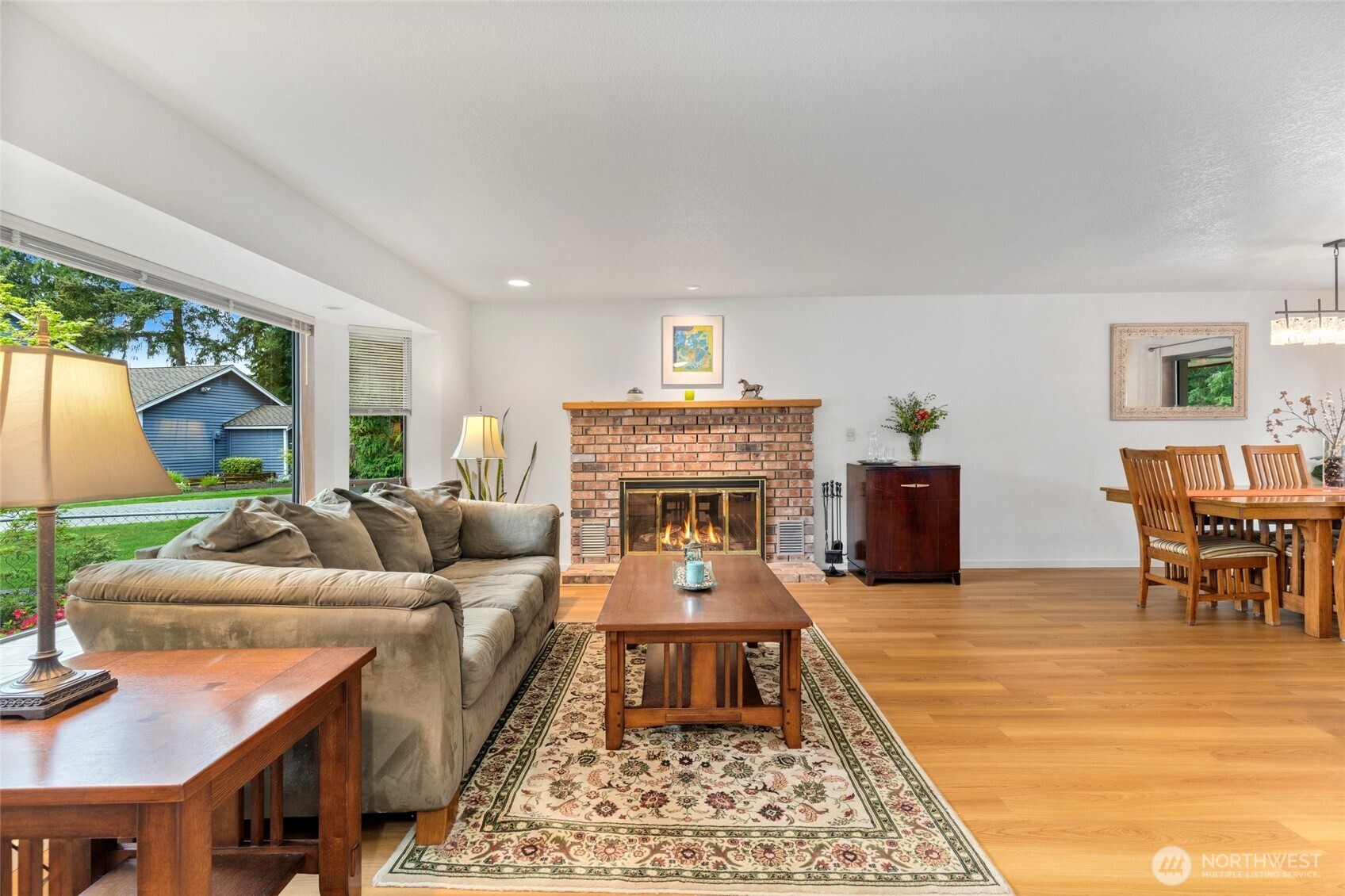 Living Room as you enter with new flooring and picture window!