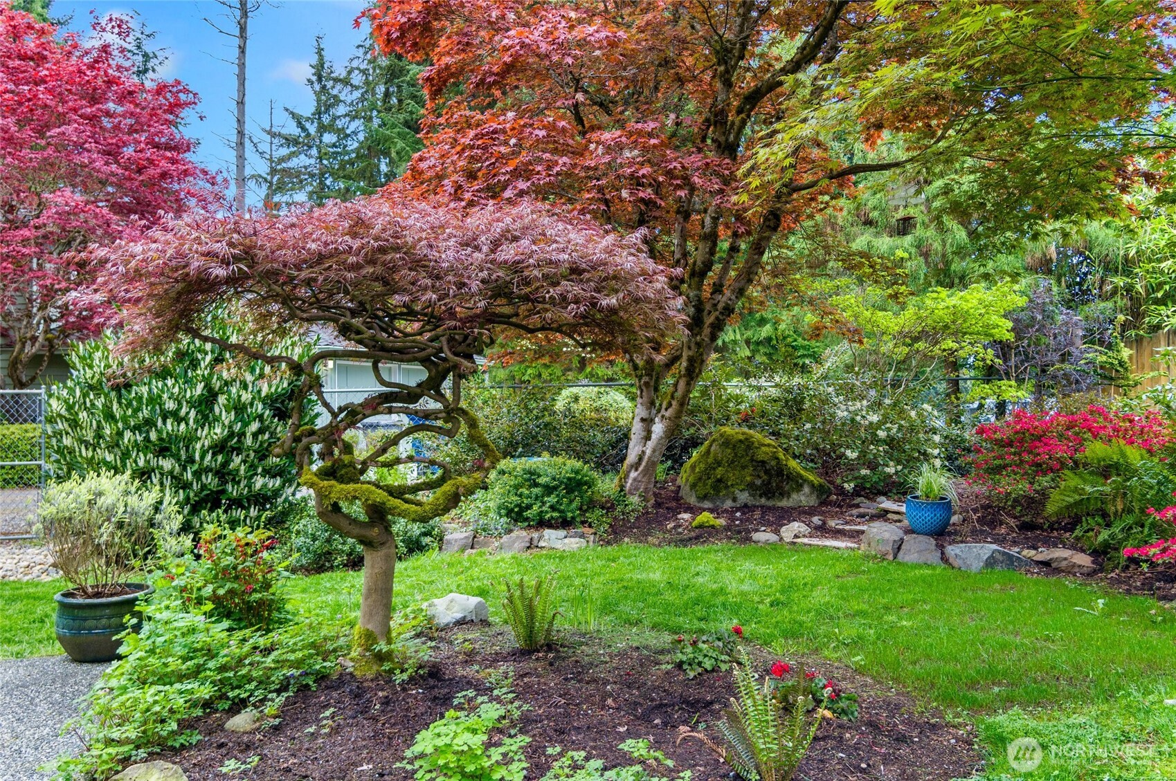 The landscaping is lush and beautiful