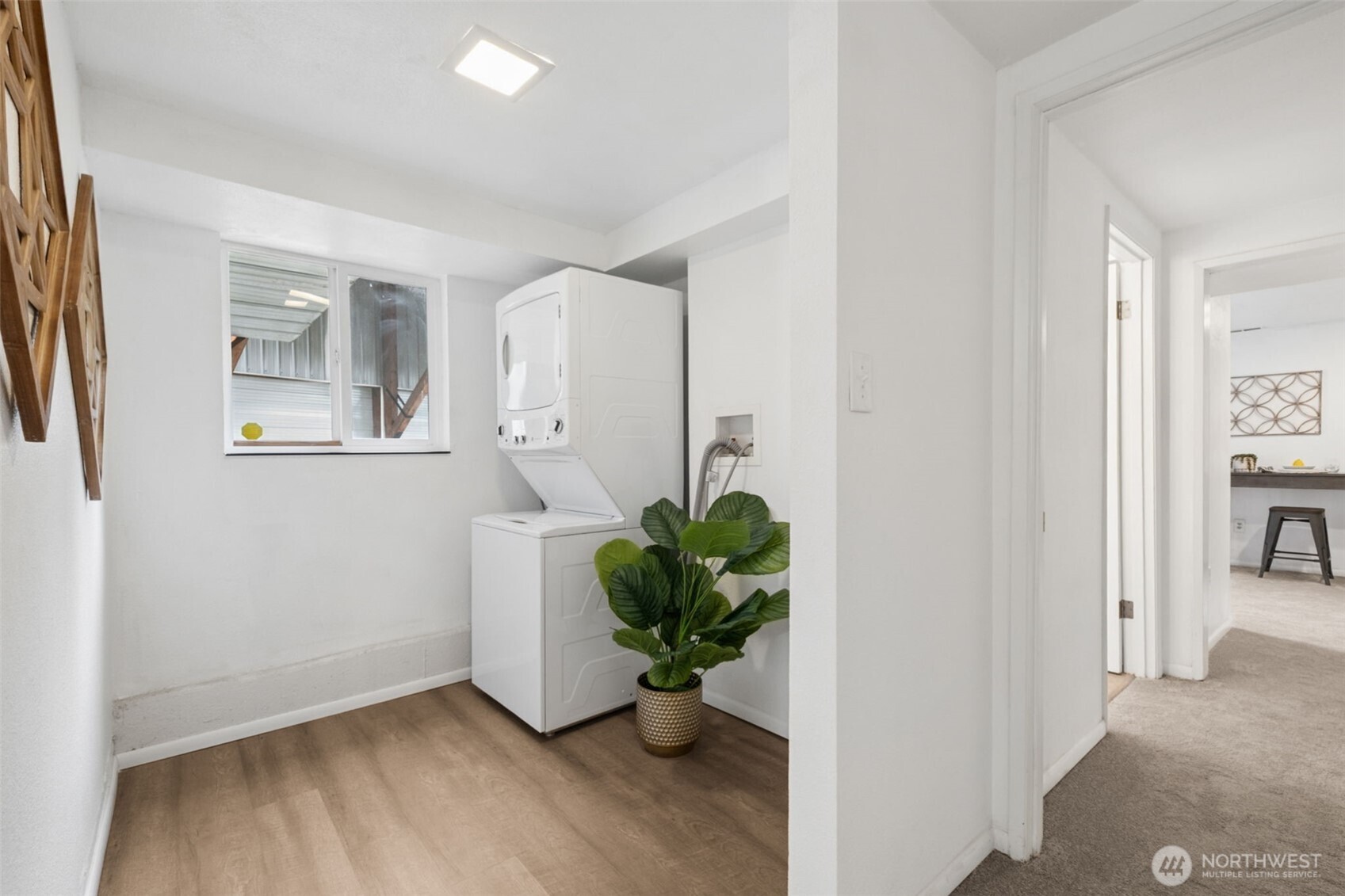 Bright laundry room with practical layout
