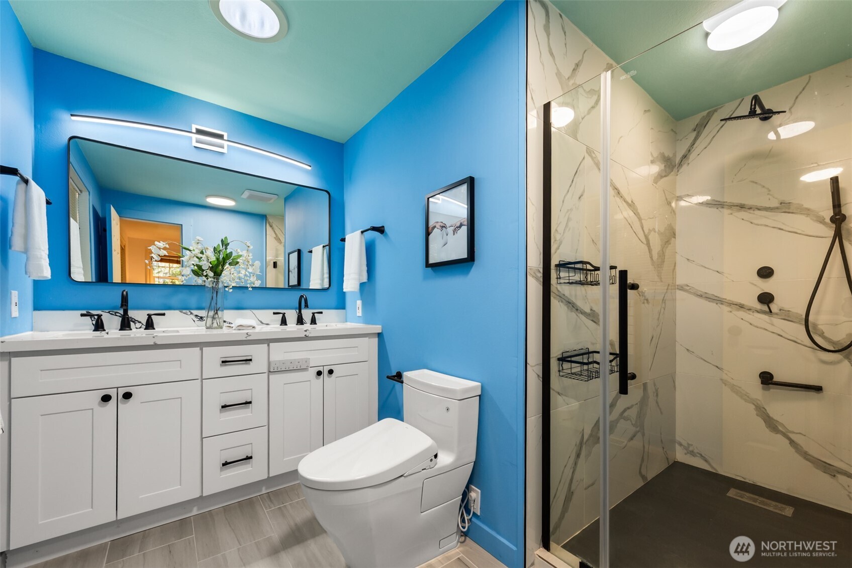 Remolded master Bathroom has a granite countertop, Toto bidet and advanced shower room