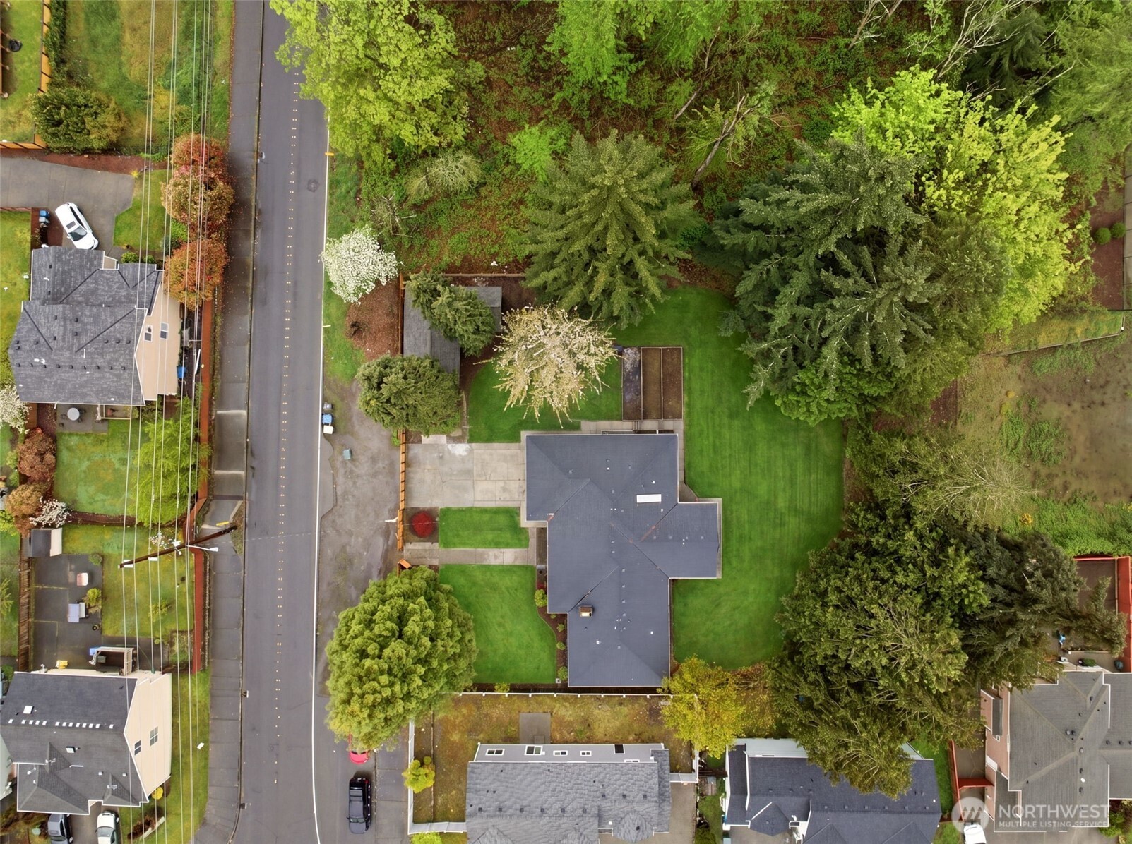 Larger lot than most houses around with natural buffer area around.