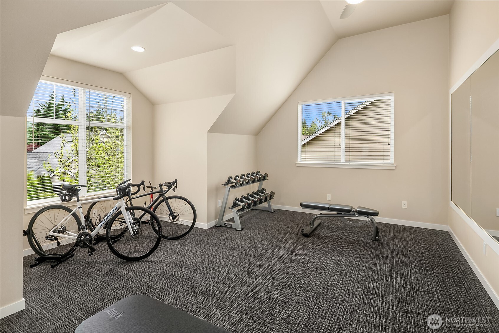 A spacious bonus room completes the upper level, ideal for a home theater, fitness studio, or game room.