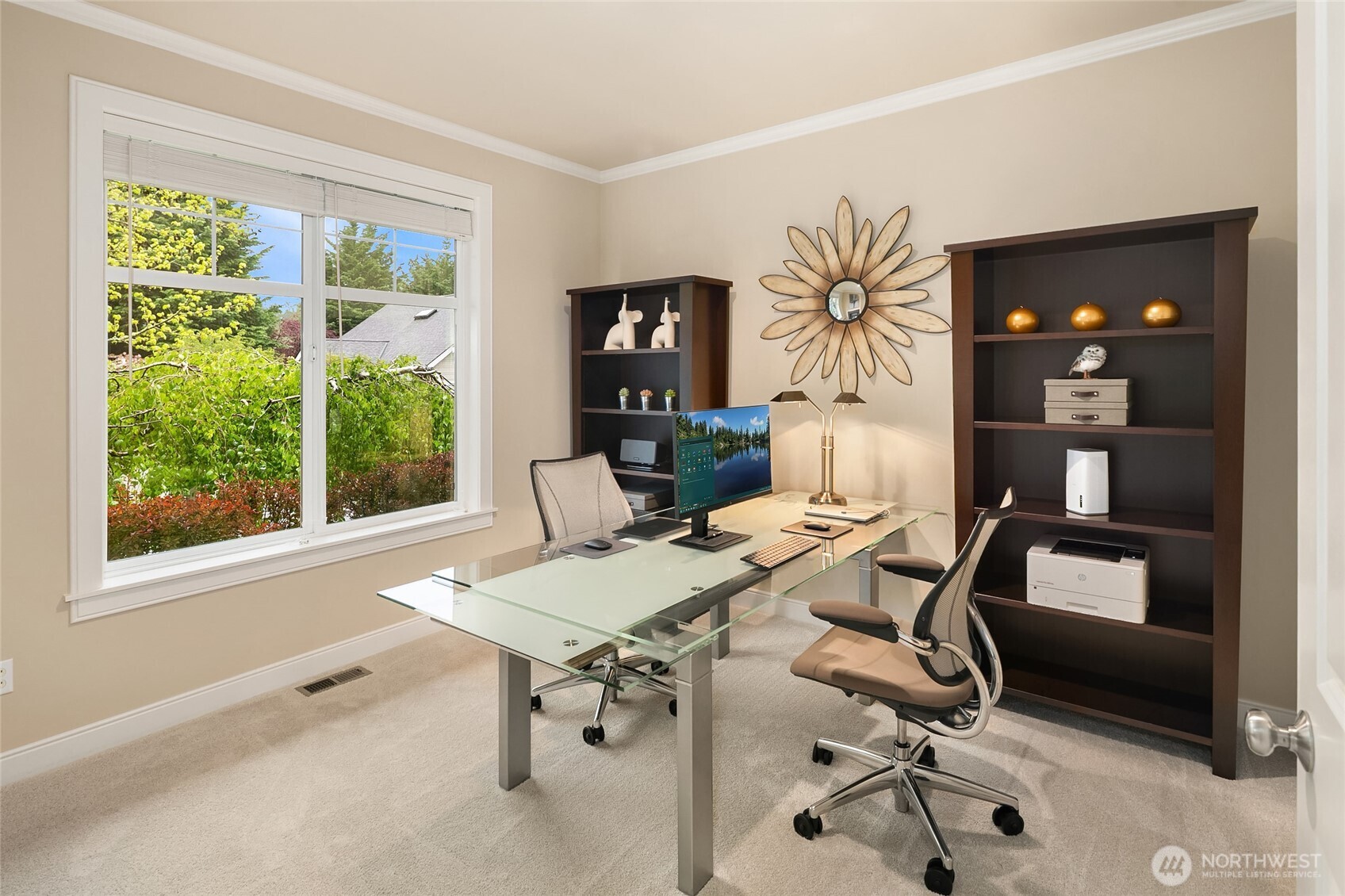 4th bedroom on main floor can be used as a den which offers flexibility for a private office, or guest accommodations.