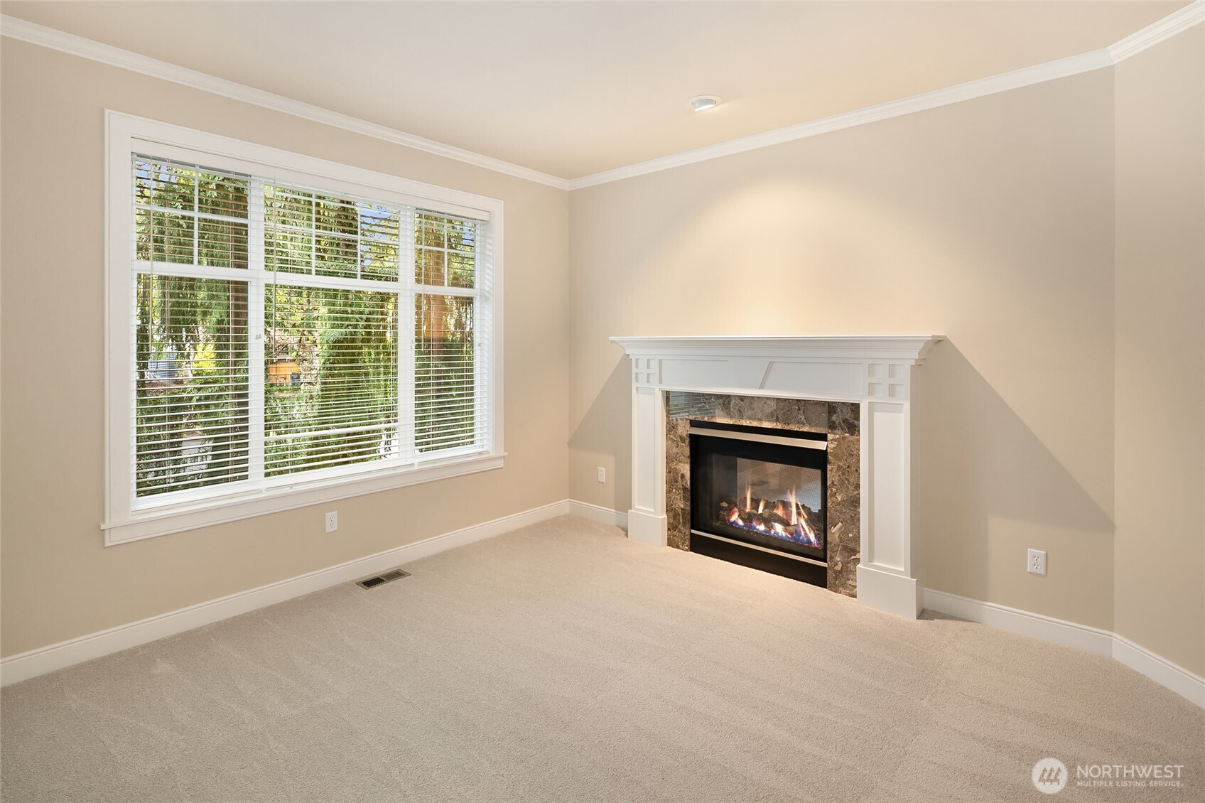 Beautiful formal living room with gas fireplace.