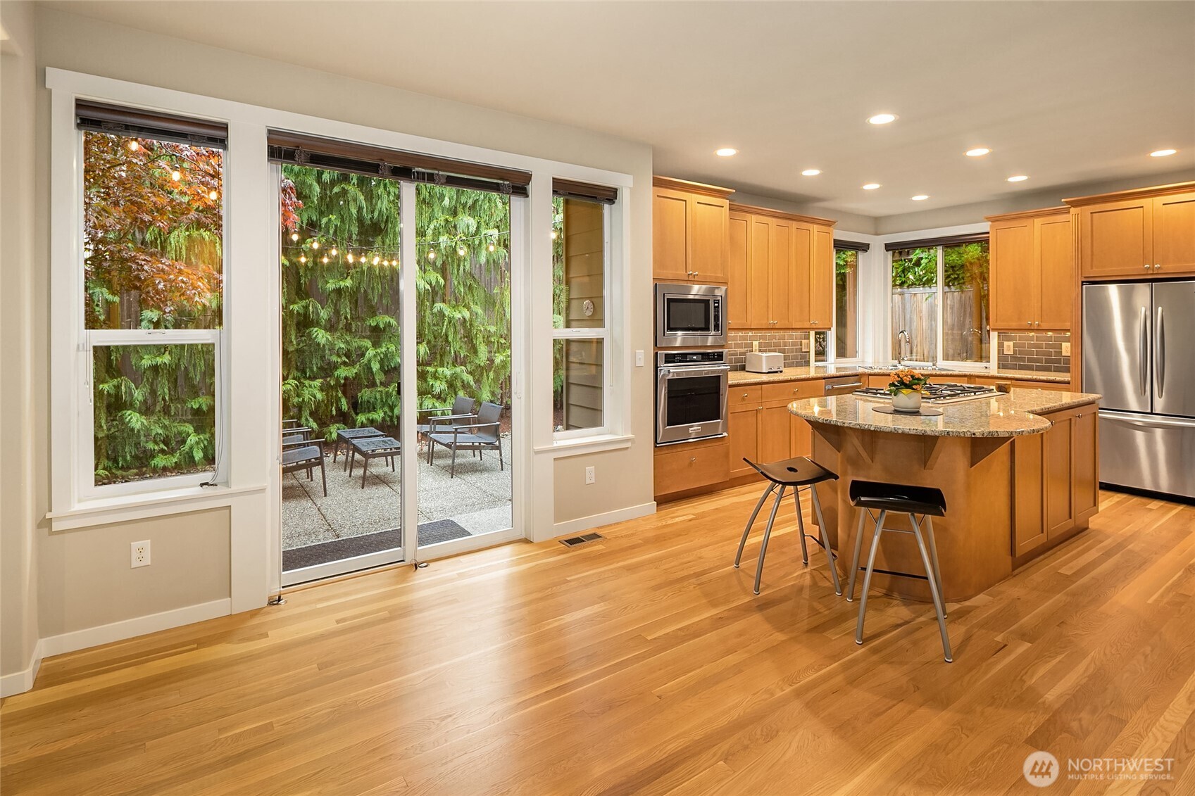 Open concept with slider to cozy private back patio.