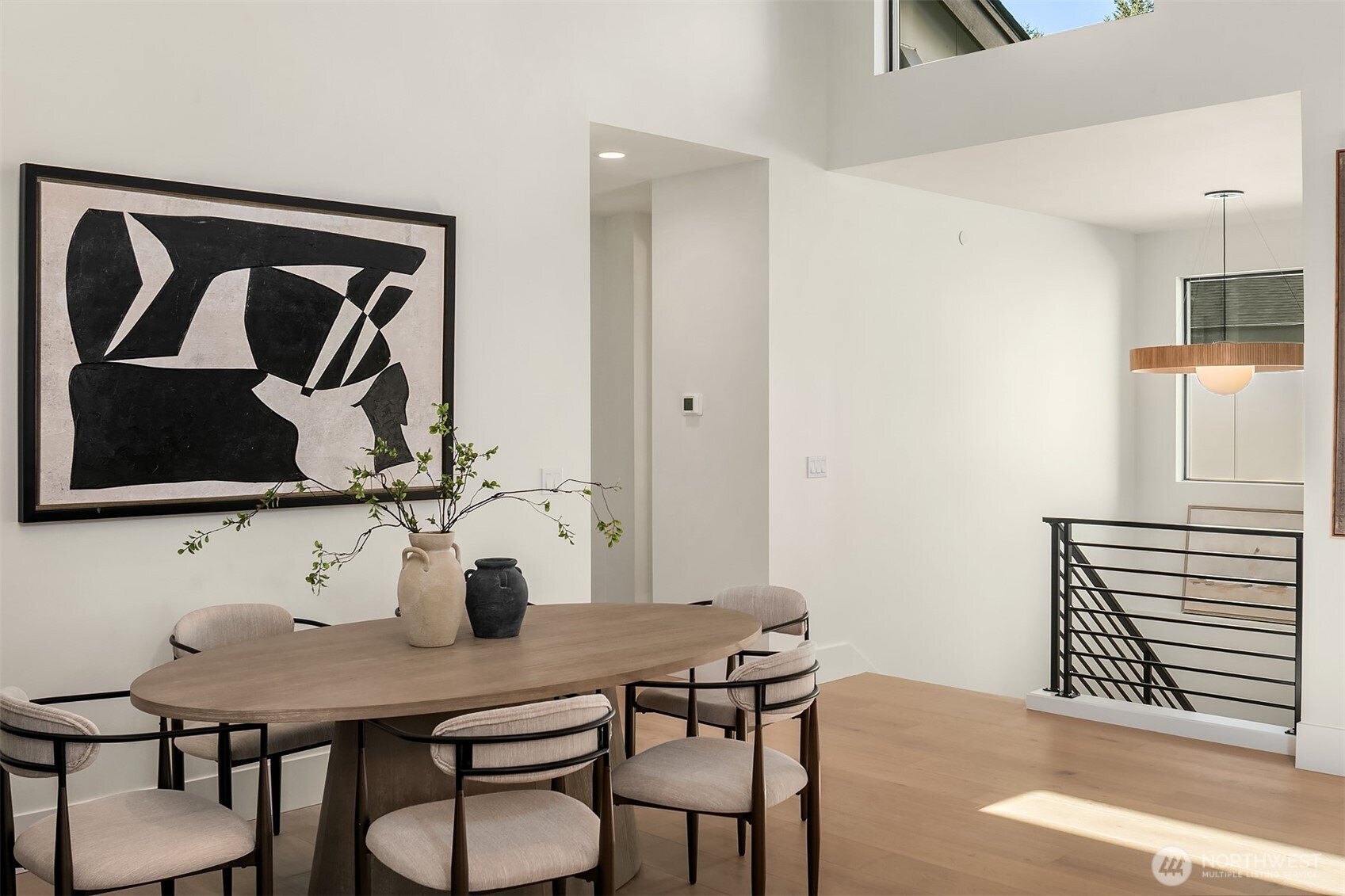 Sunlight pours in from every angle, filling the home with warmth, light, and an open, airy feel.