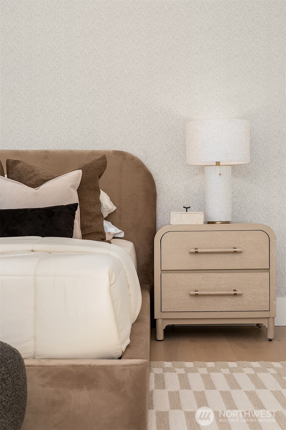 A spa-inspired bath featuring heated floors, toe-kick lighting and natural light streams from skylight.