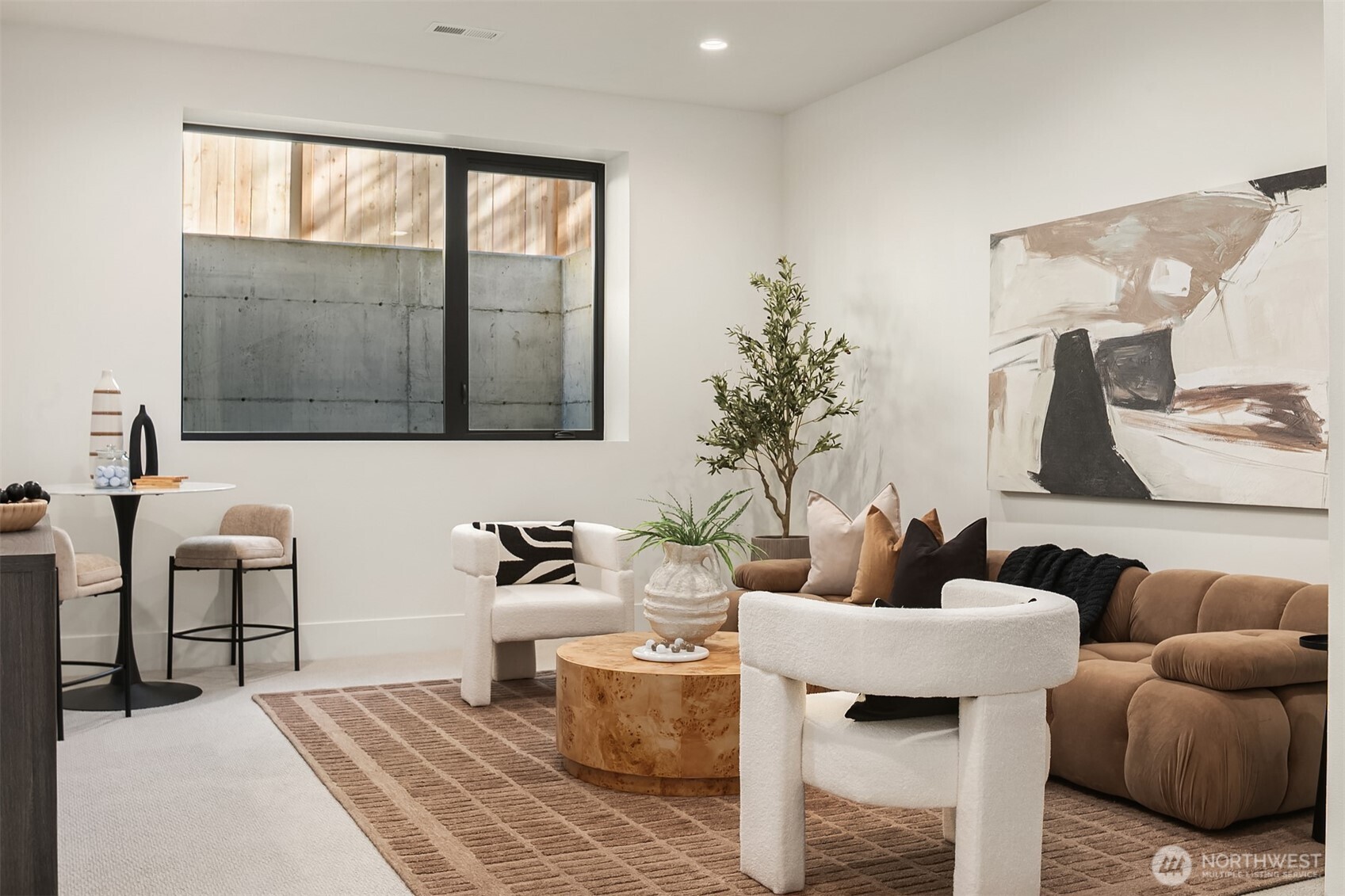 Direct access to mudroom with built-in benches and storage, keeping life organized and clutter-free.