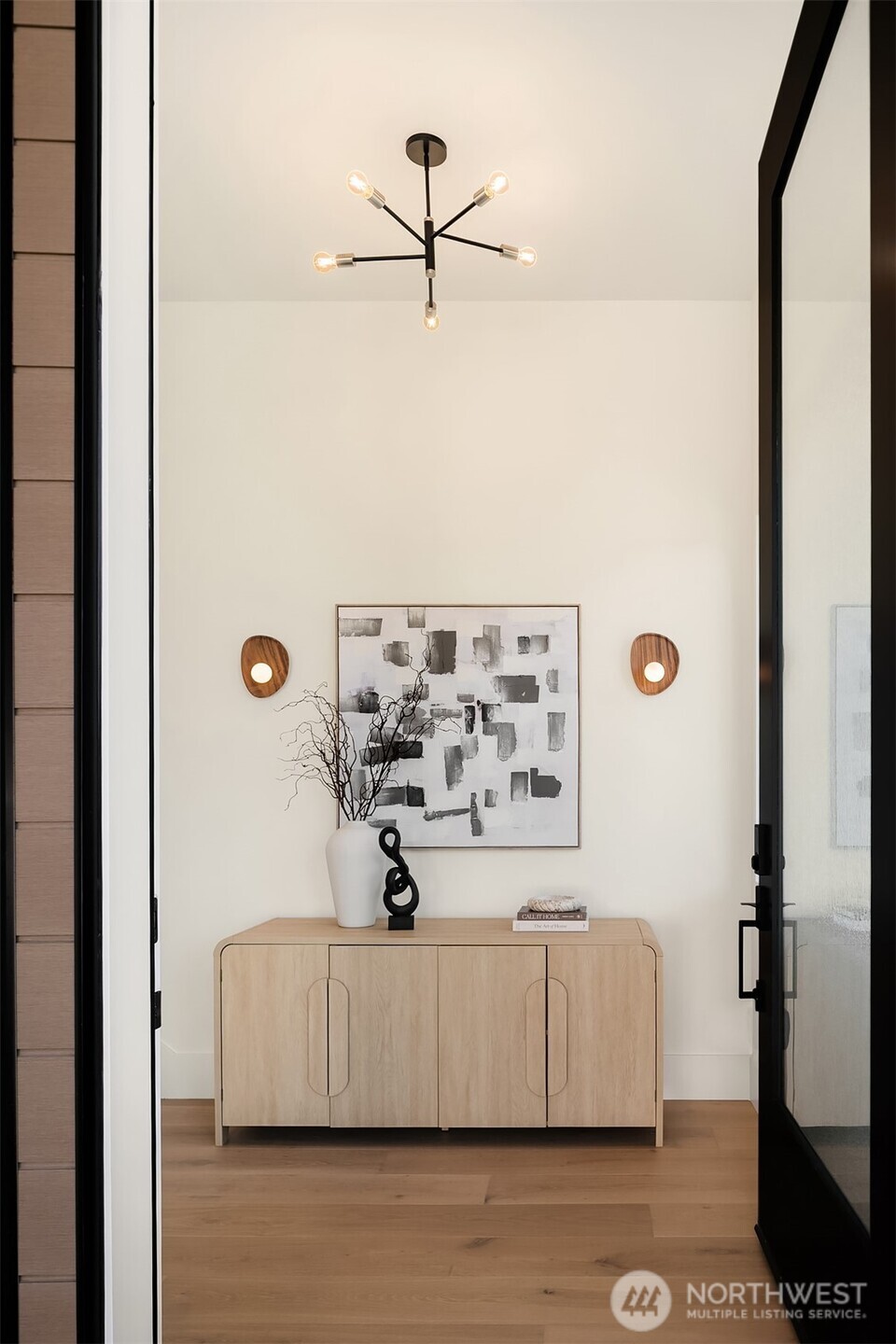 Soaring 14-foot exposed beam and tongue-and-groove ceilings create an airy, architectural statement.