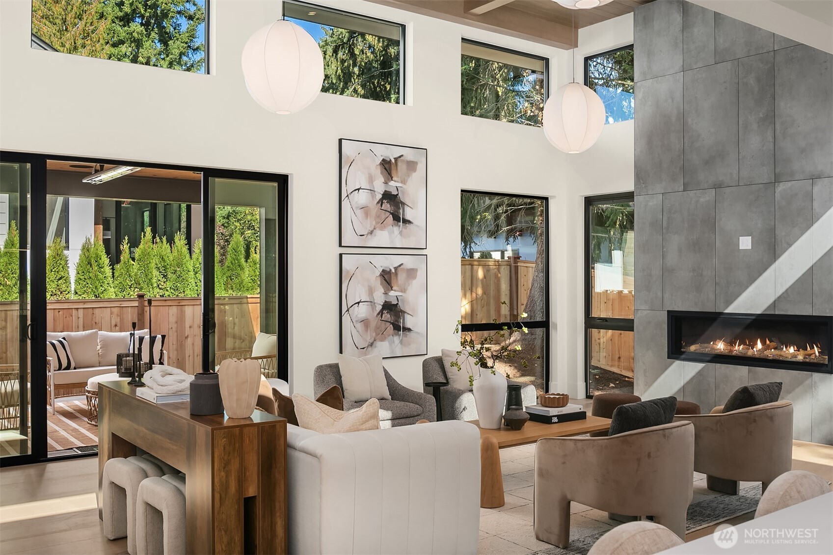 Sculptural designer lighting and built-in speakers enhance both ambiance and functionality.