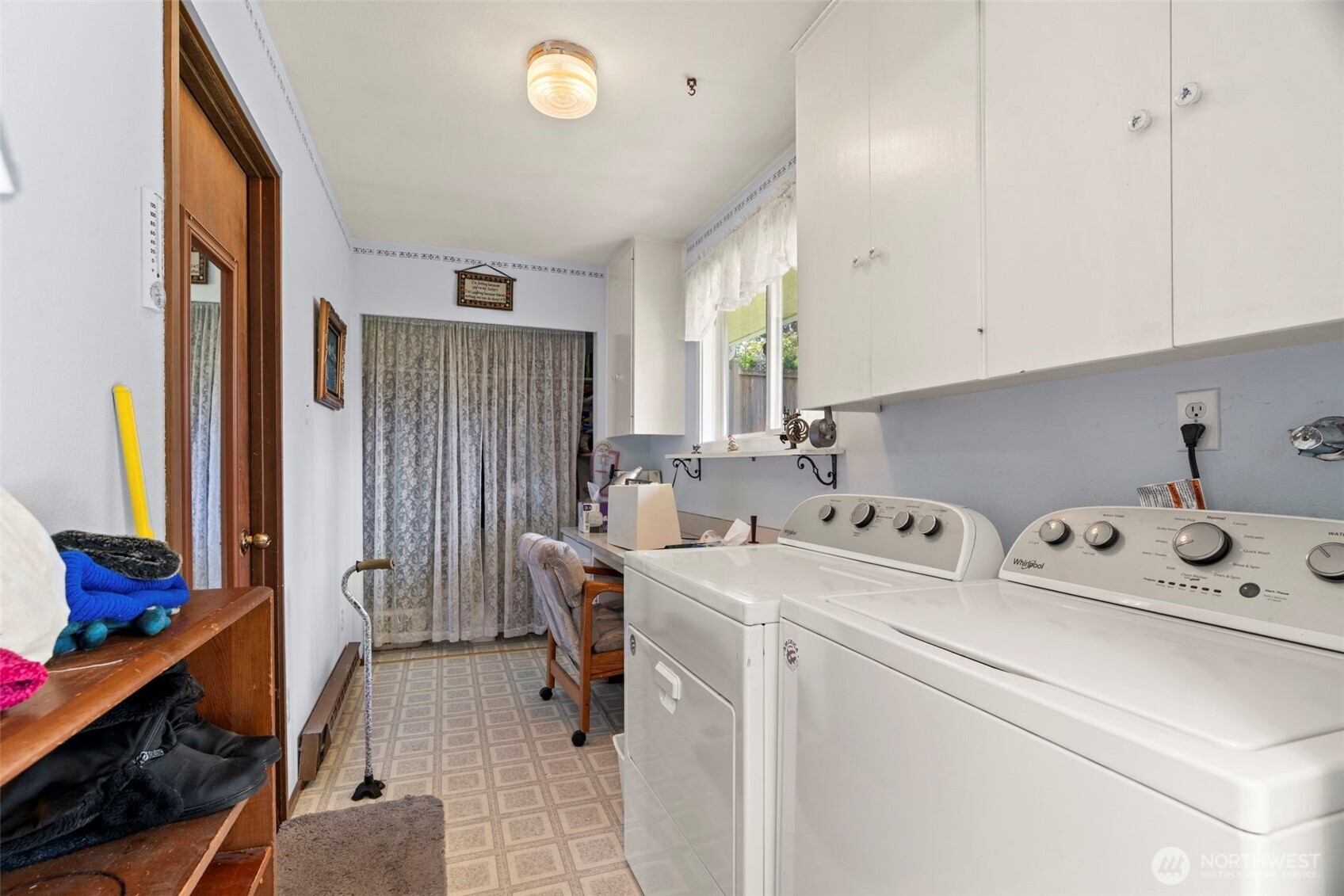 Laundry room with door to garage