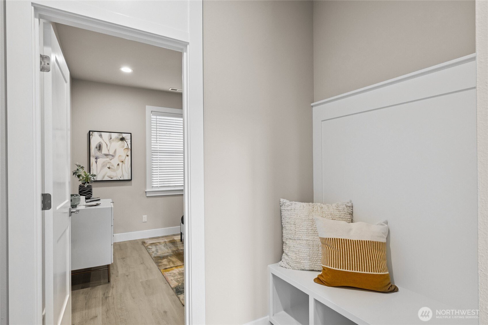 Perfect office space or guest suite on main level. Photos are for representation purposes only.