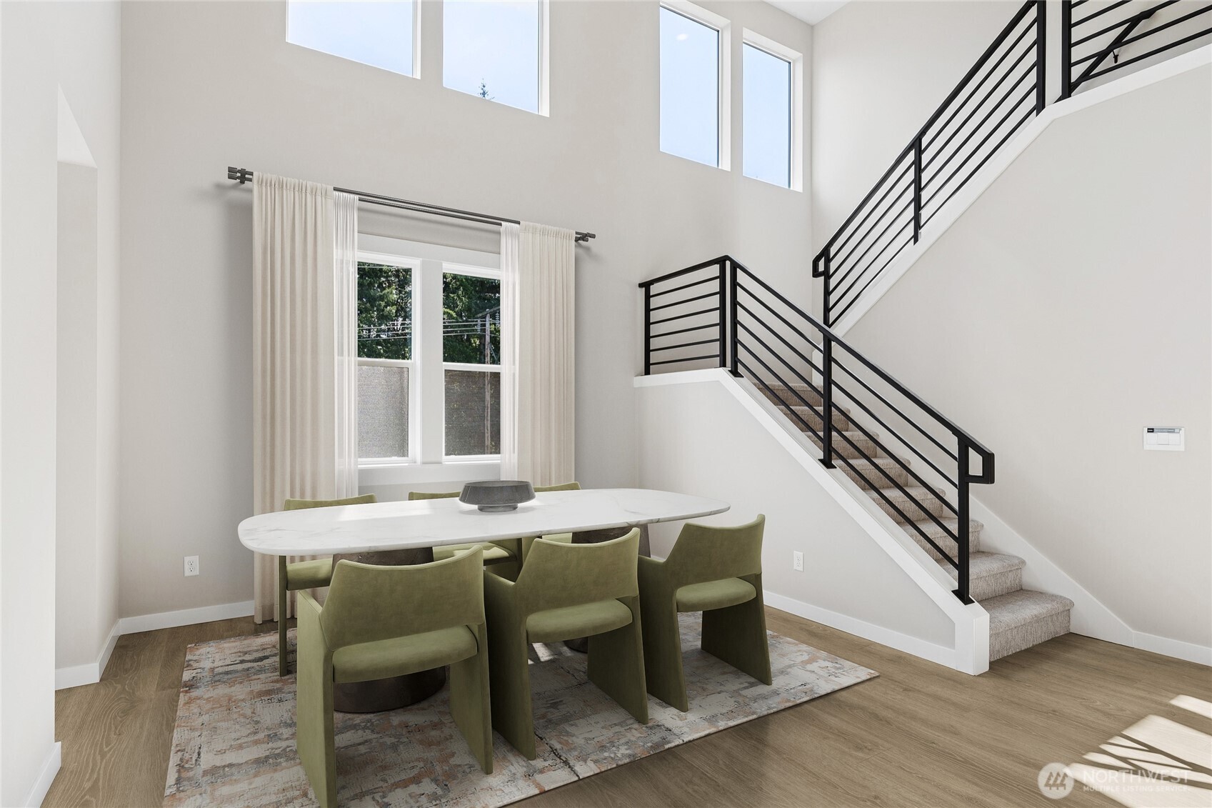 Dramatic 2-story formal dining room with tons of windows - this is from another Brighton home, virtually staged.