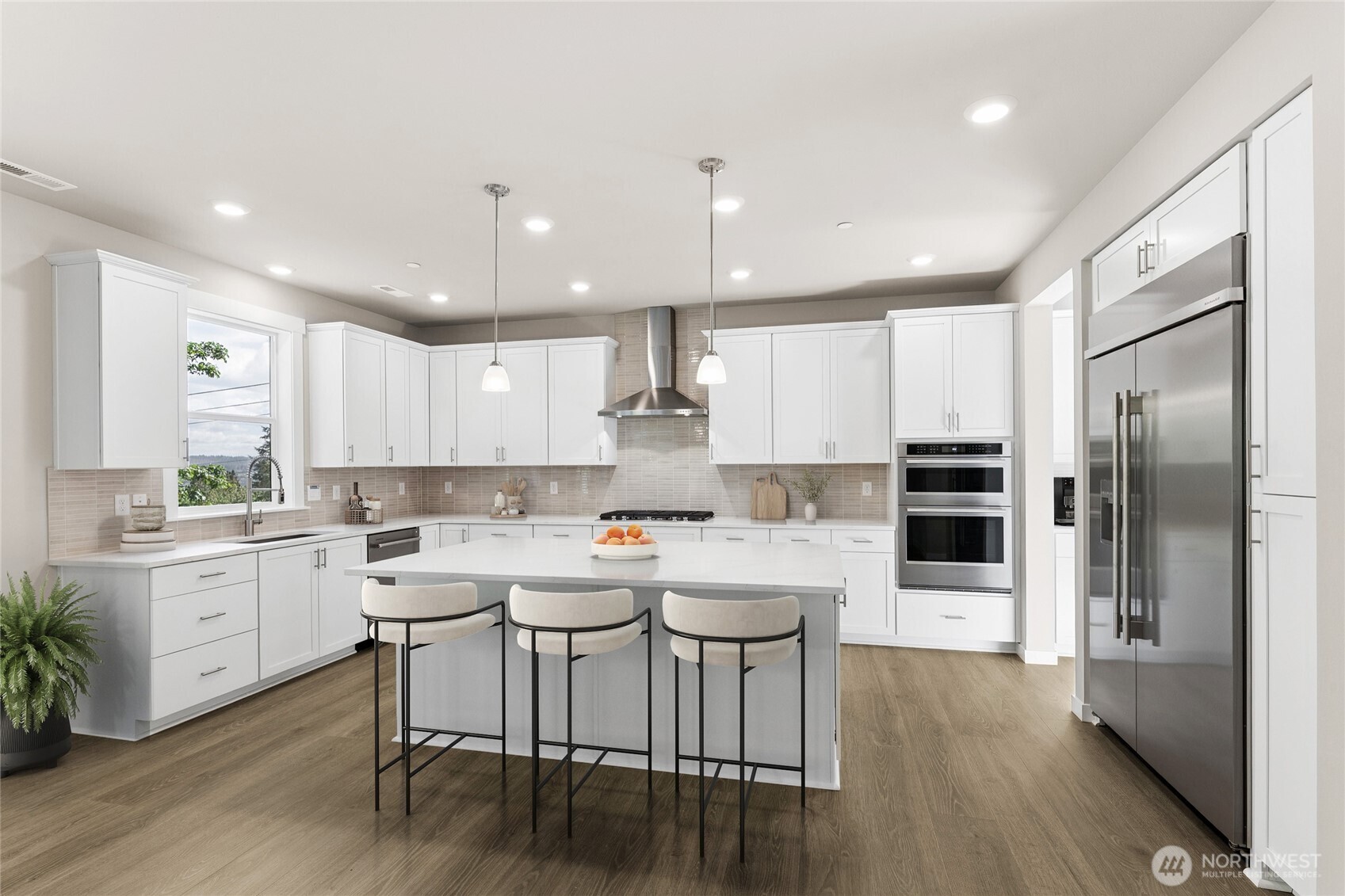 Brighton home from another community (refrigerator not included) lighting package will be stainless.  Virtually staged, with same color palette.  This kitchen has a ton of storage, great for entertaining!