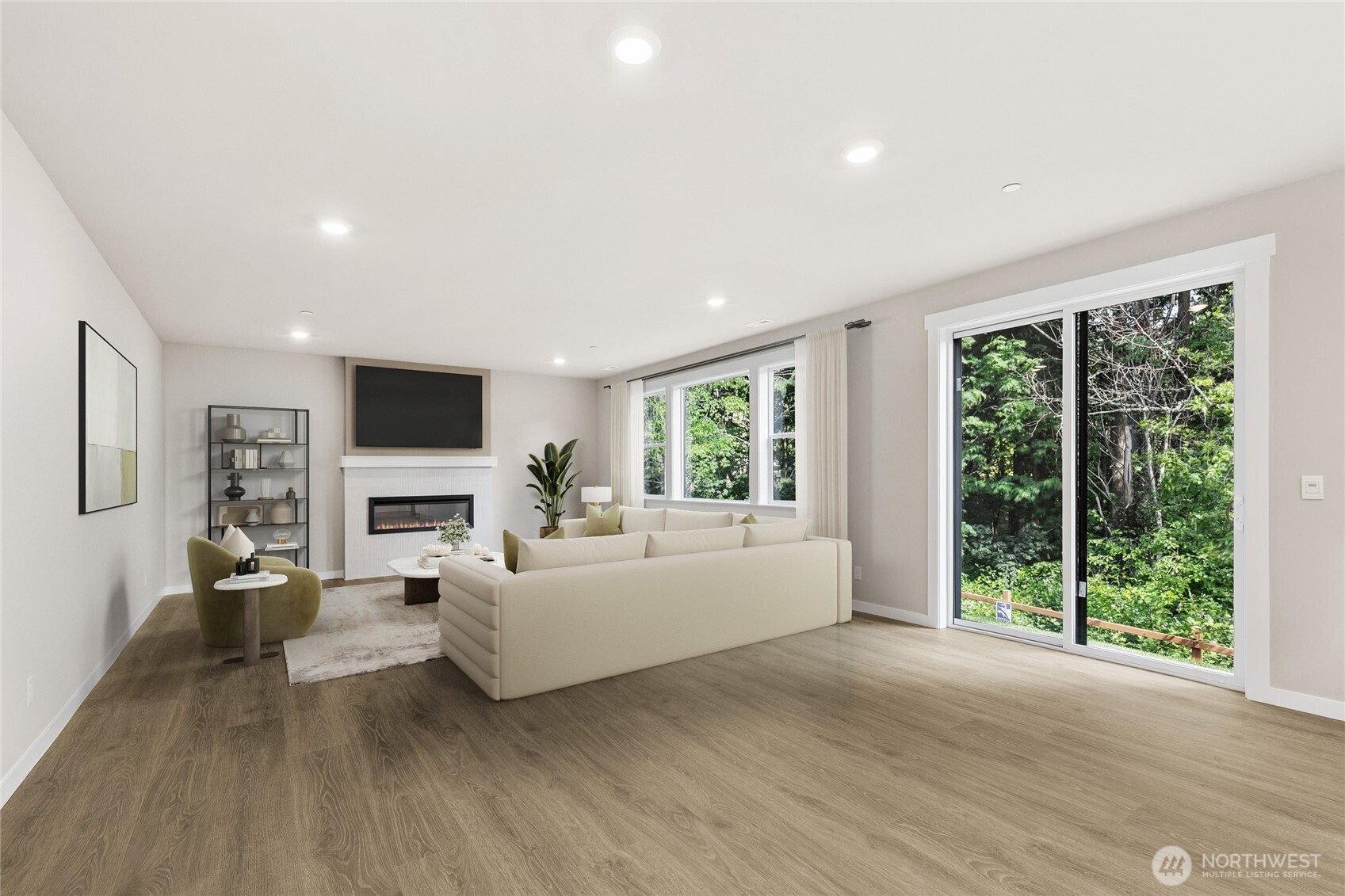 Virtually staged, this home has plenty of space for informal eating area - fireplace will be a file tiled wall w/out mantel providing options to choose TV height.