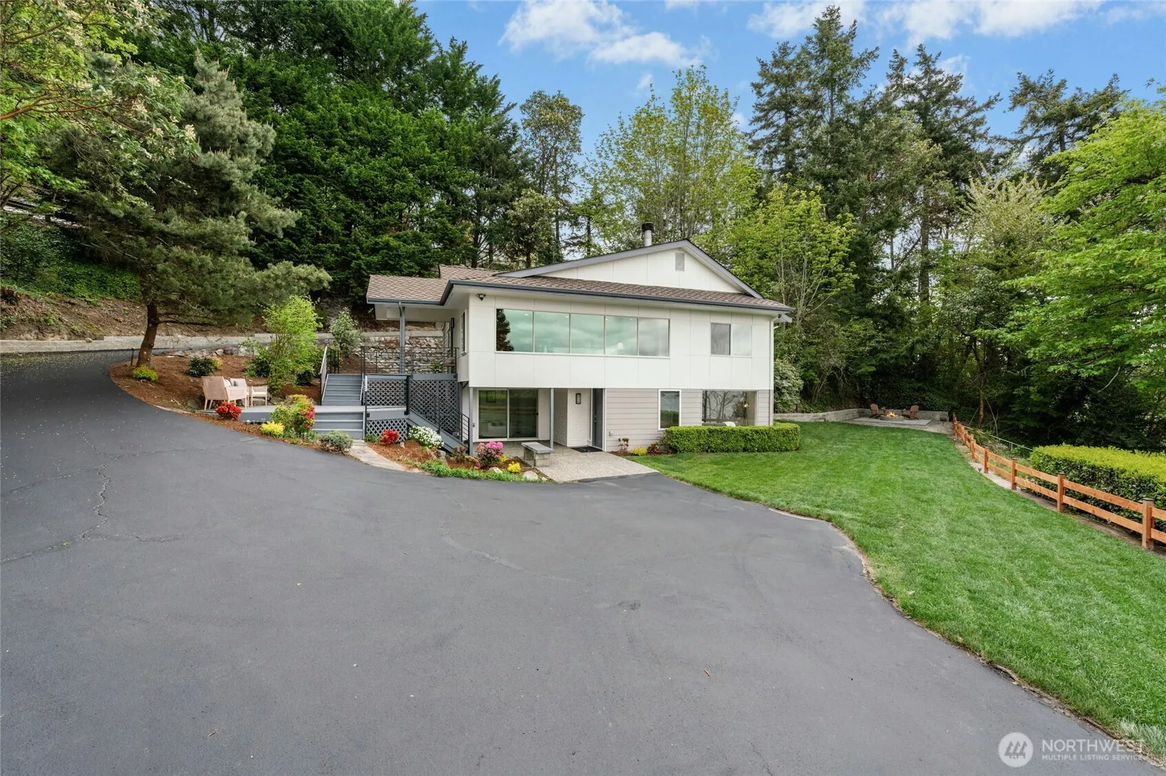 Beautiful southerly Lake Washington views from this immaculate 3 bedroom, 2 bath, 2,356 square foot home in a true one-of-a-kind private setting.