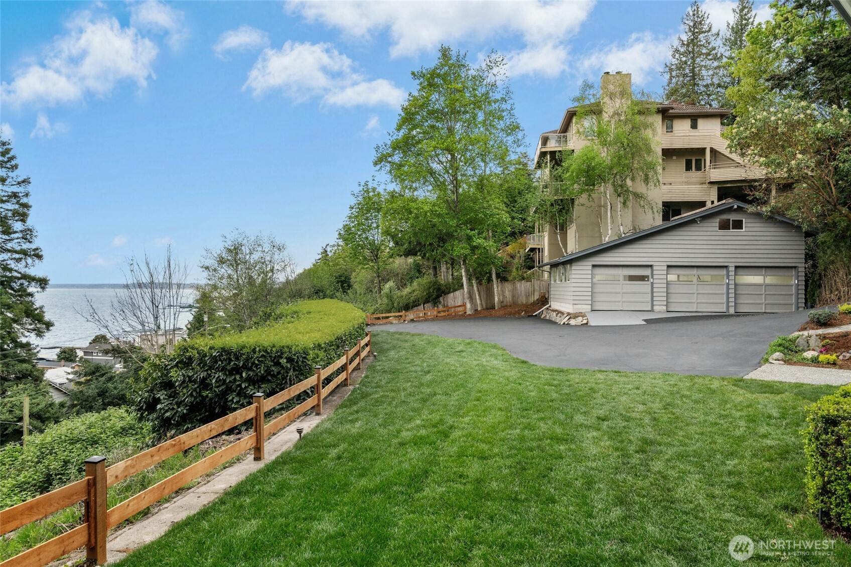 A large detached 3 car garage (693 SF) with additional 462 SF of 2nd floor storage – perfect for potential DADU