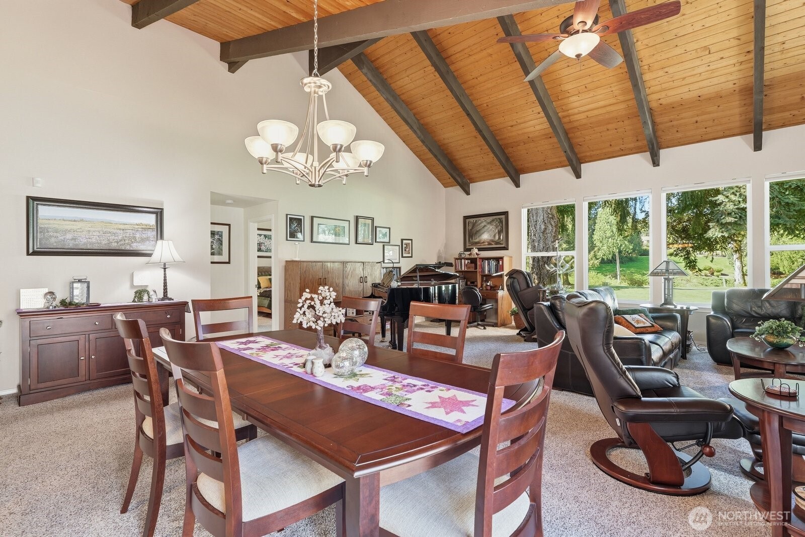 The dining room flows effortlessly into the massive living area, making it ideal for large-scale entertaining.