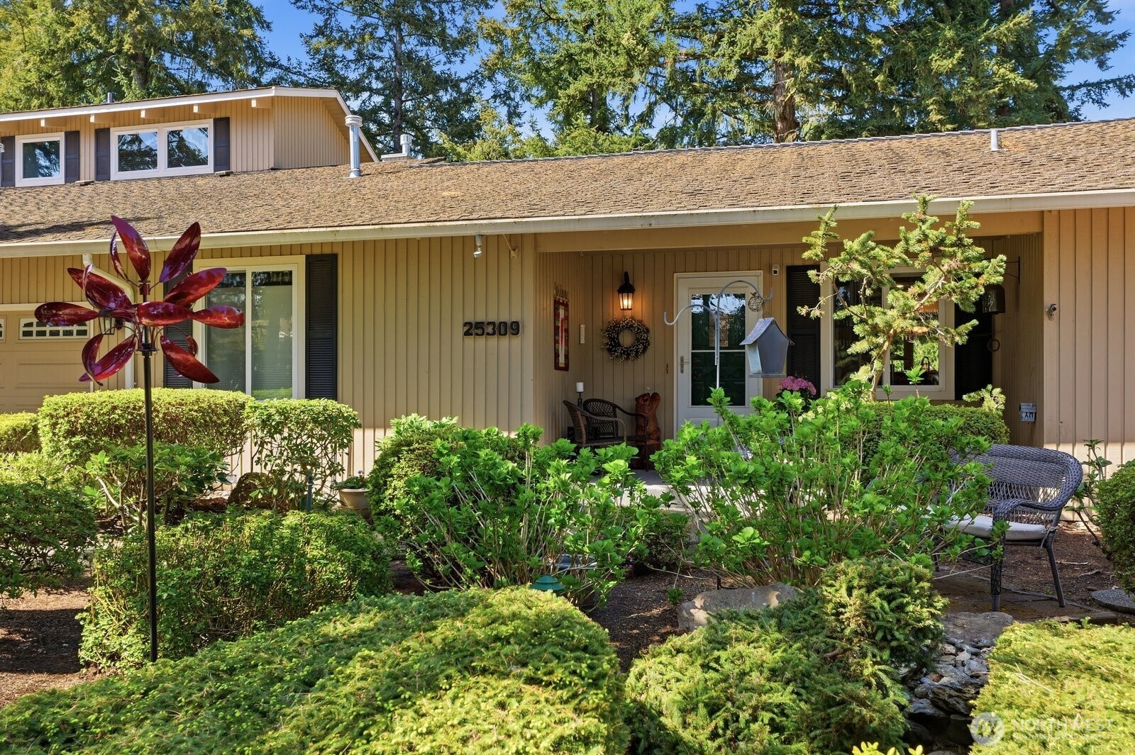 Showcasing the 50-year roof with brand-new ridge caps (April 2026) and updated vinyl windows.