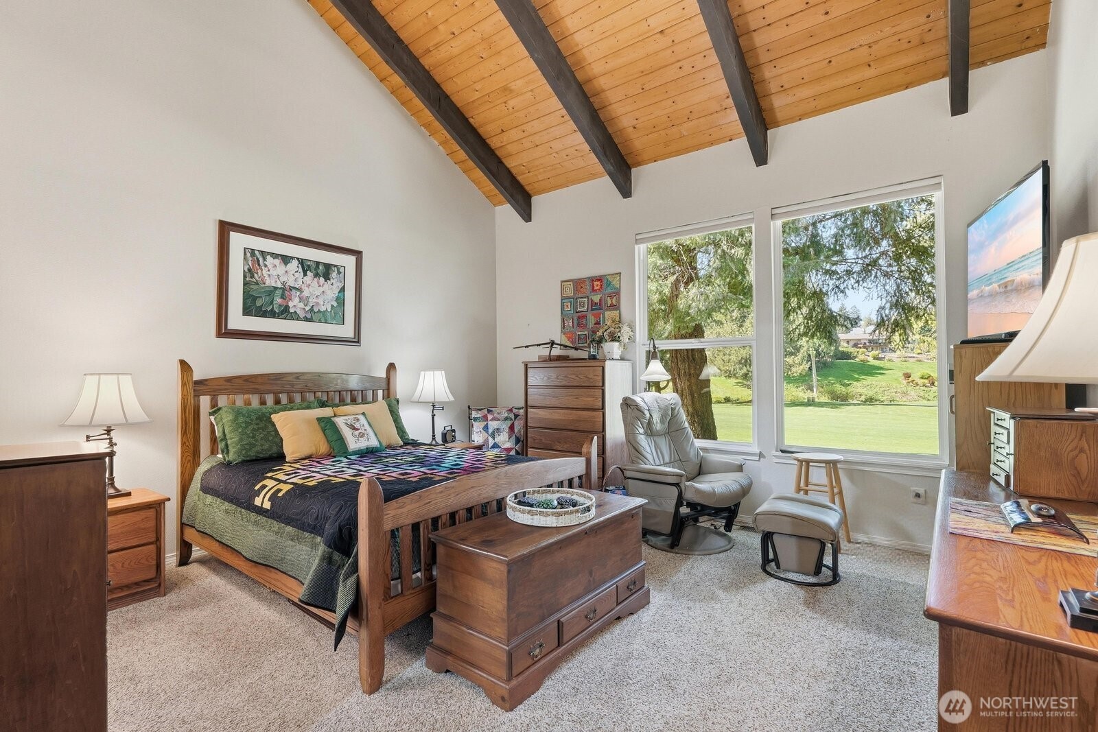 A massive retreat with plush updated carpet and ample room for a king-sized furniture suite.