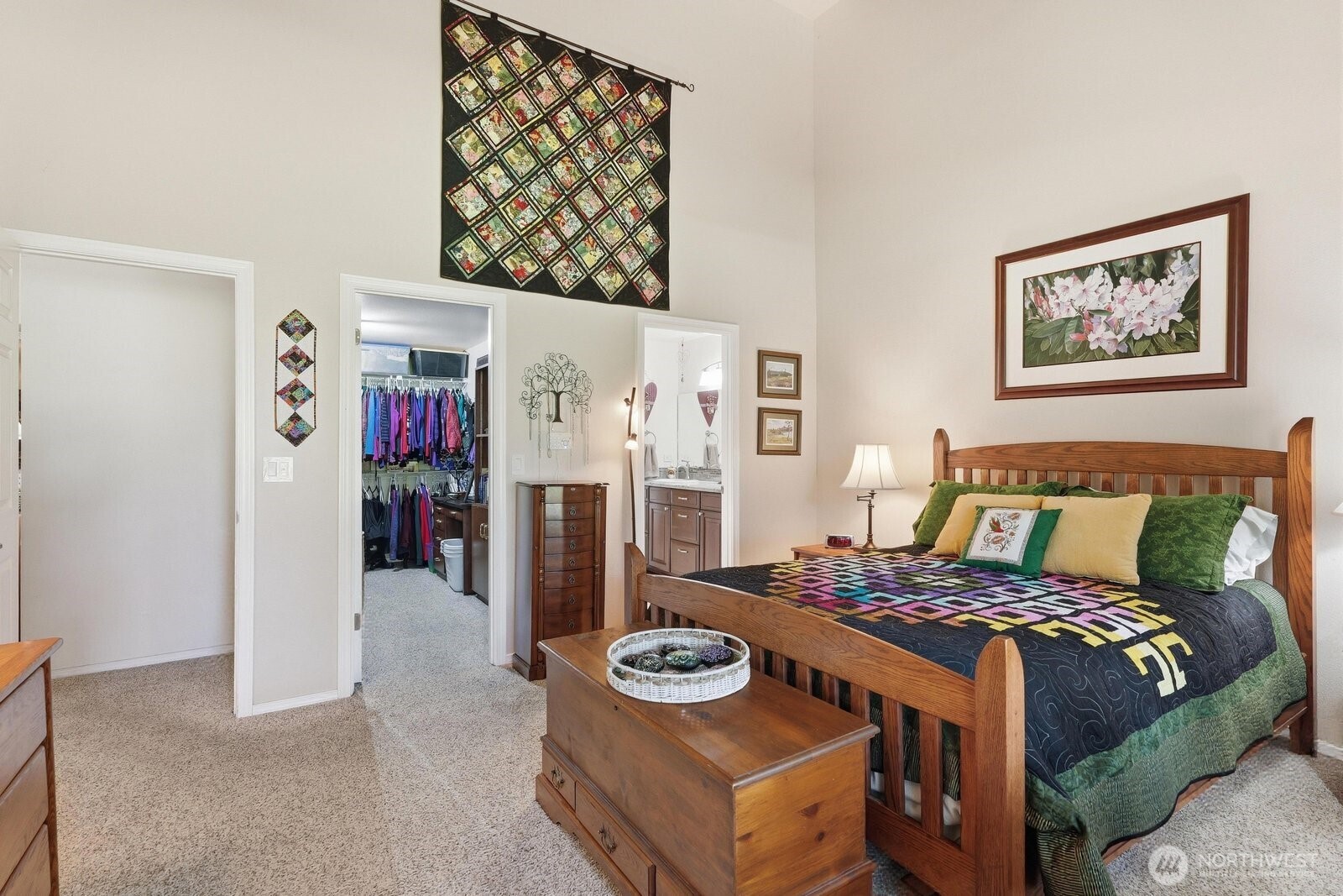 The primary bedroom features a large walk-in closet and an updated 3/4 bathroom.
