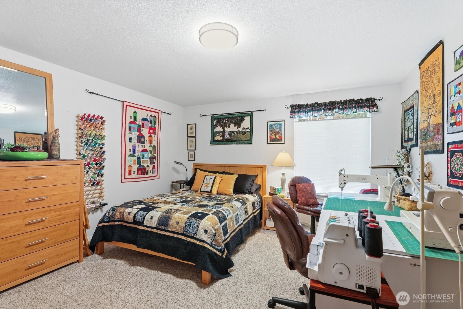 The impressively oversized second bedroom features a walk-in closet and plenty of space for a king-sized bed plus a desk or craft area.