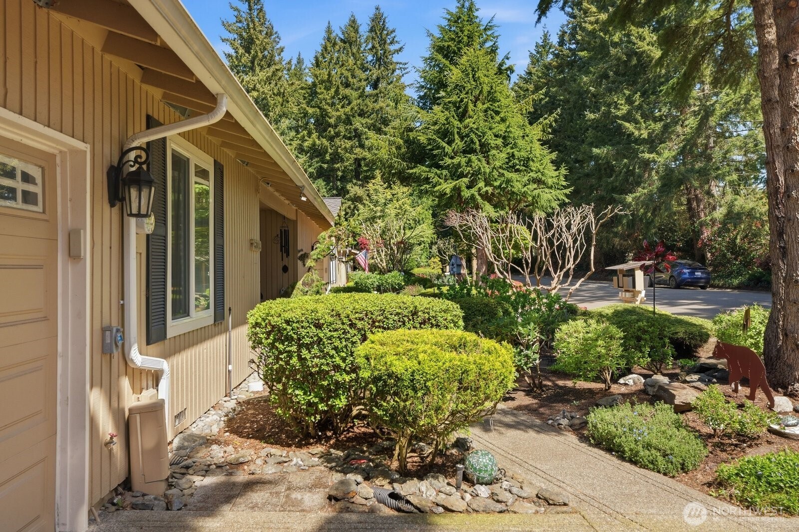 A lush, manicured landscape and private walkway lead you to this impeccably maintained single-level home.