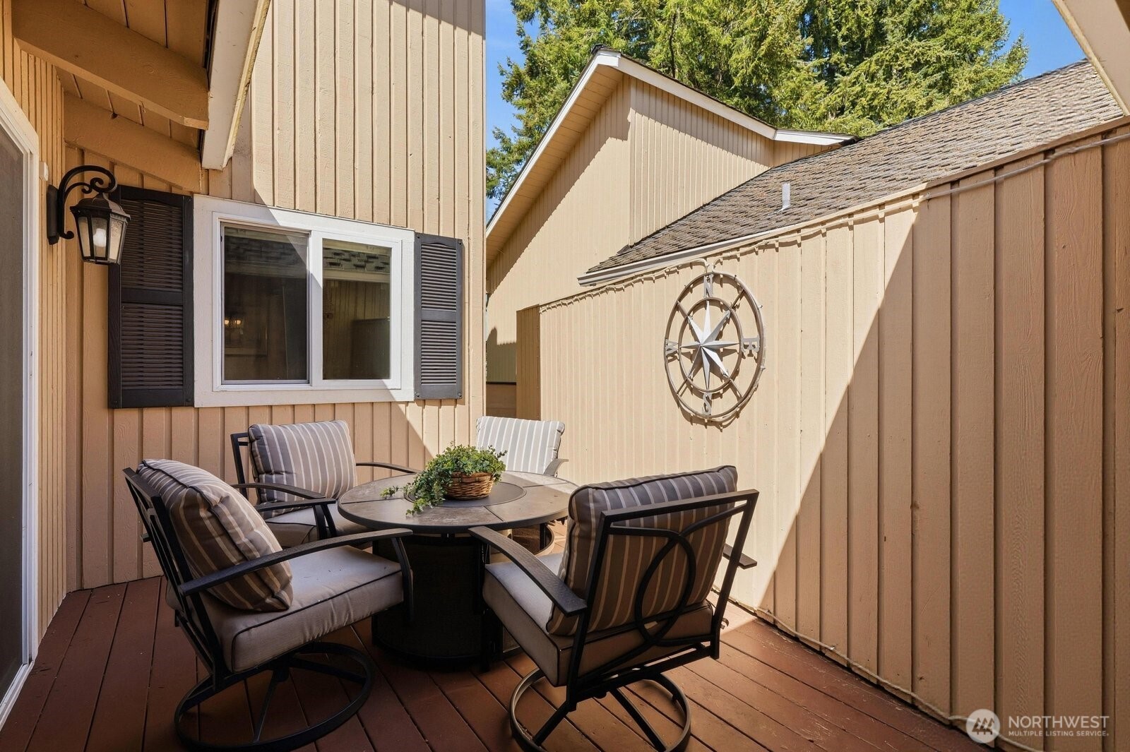 Recently painted back deck offers two distinct areas for relaxation and fairway viewing.