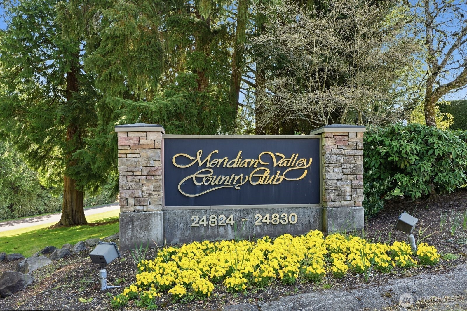 The iconic Meridian Valley Country Club entrance marks your arrival into this premier, 24/7 guarded-gate community.