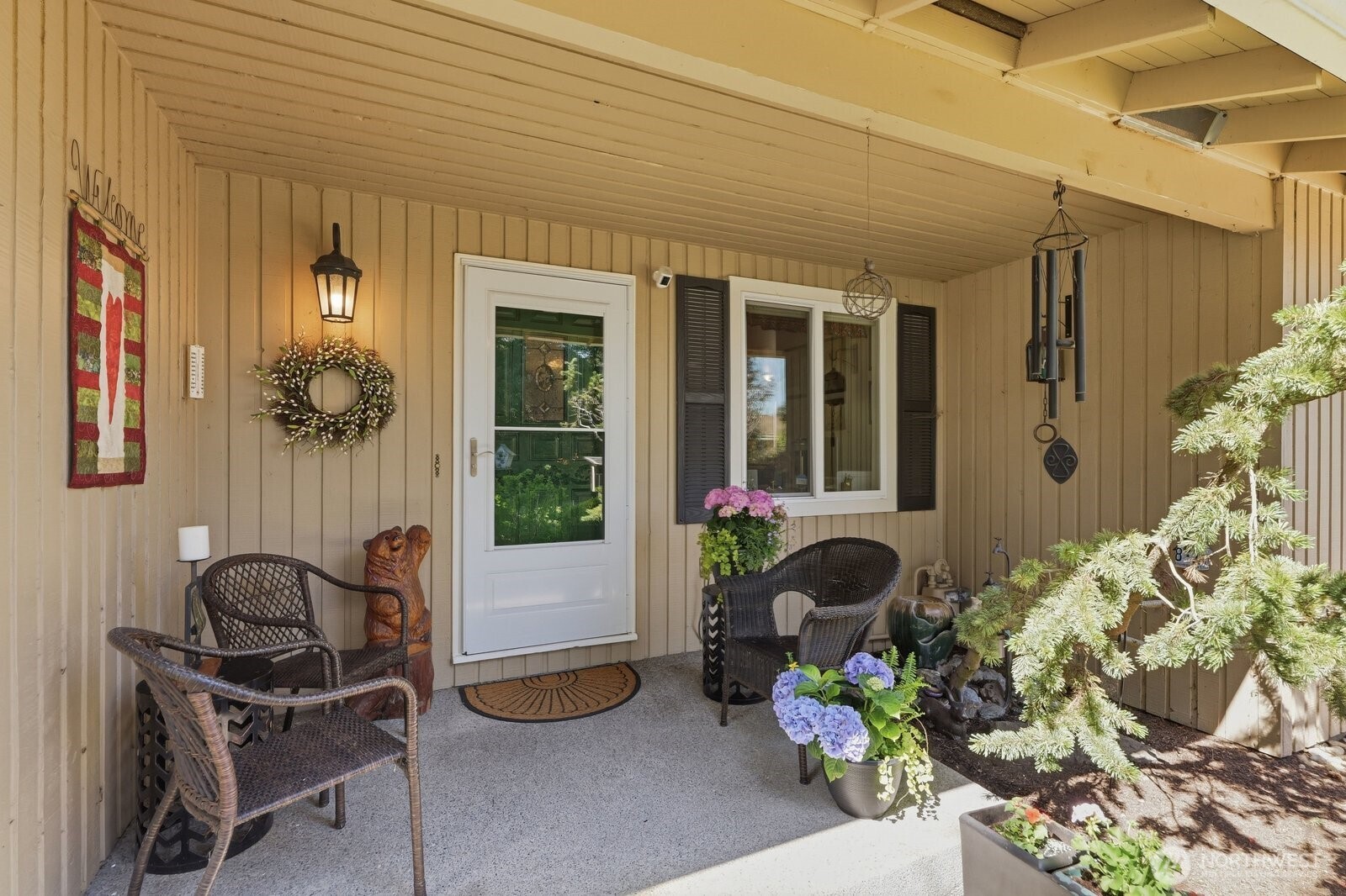 A peaceful, private spot for morning coffee overlooking the manicured front gardens.