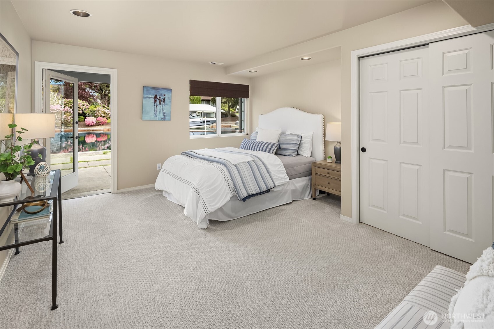 A private lower-level ensuite with direct outdoor access—ideal for guests, extended stays, or multigenerational living with a sense of independence.