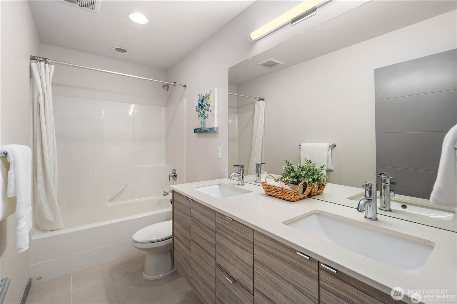 Massive primary bedroom with ample room for King bed, an assortment of furniture, with excellent Western exposure.