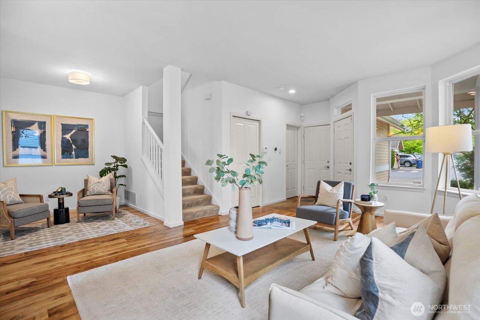 Open floor plan with a powder bath on main and access to a one car garage.