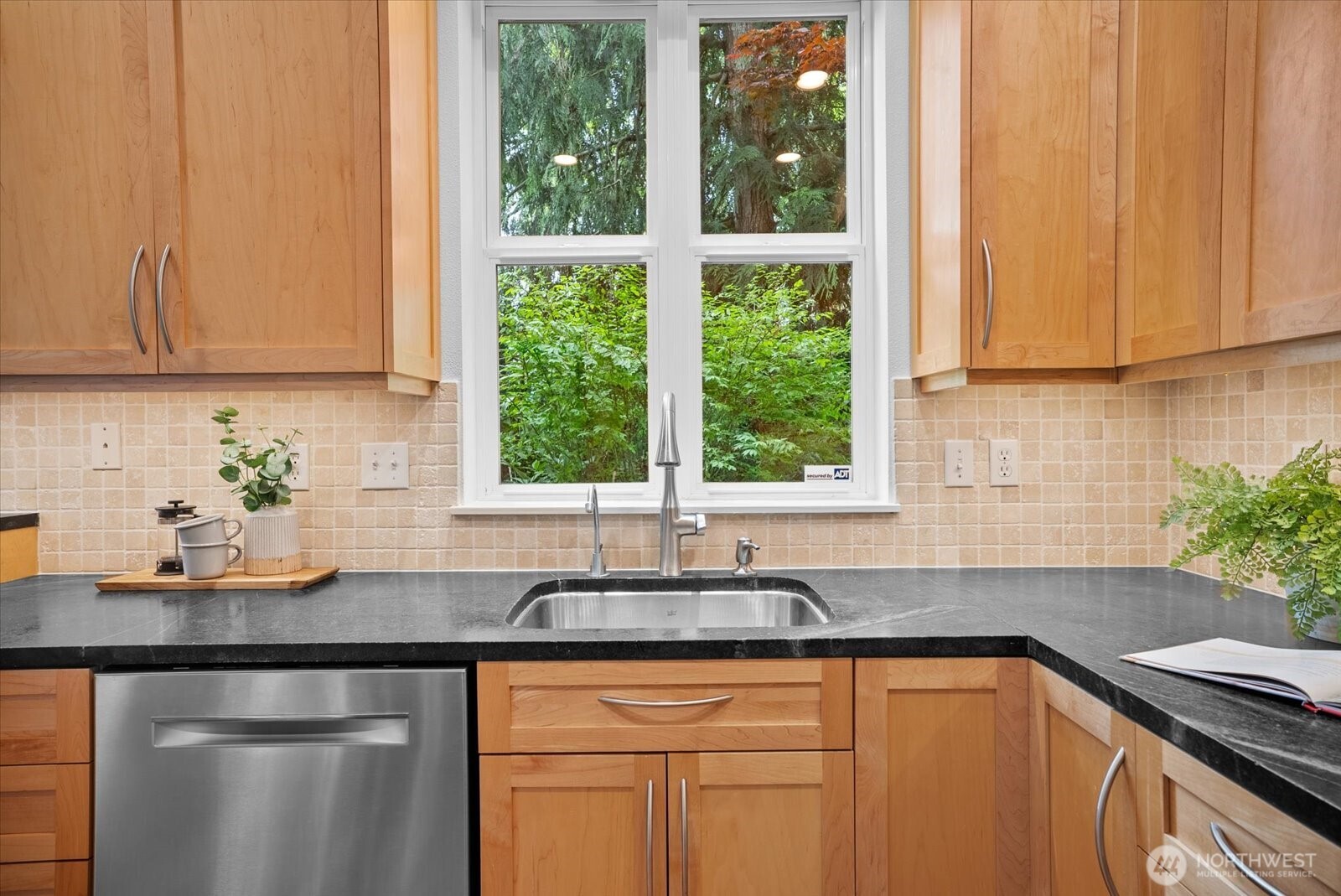 A serene view from the kitchen sink.