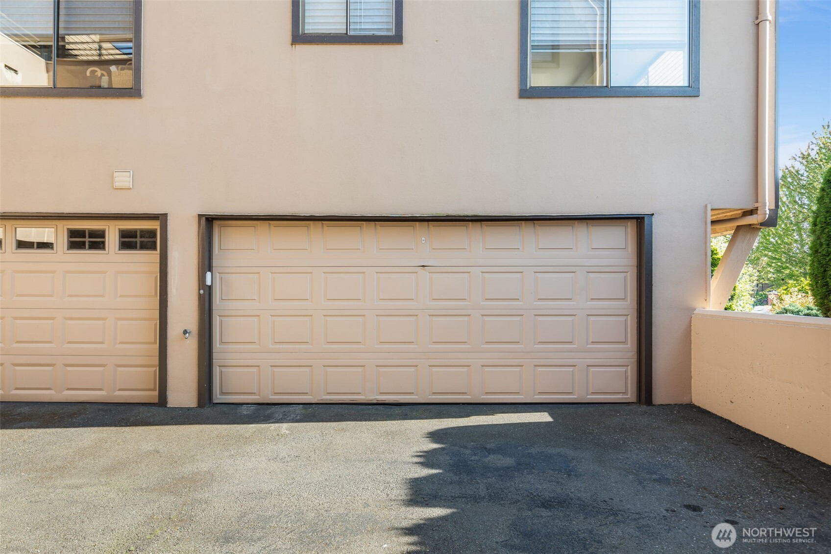 Secure double parking garage, & 2 dedicated additional uncovered spaces