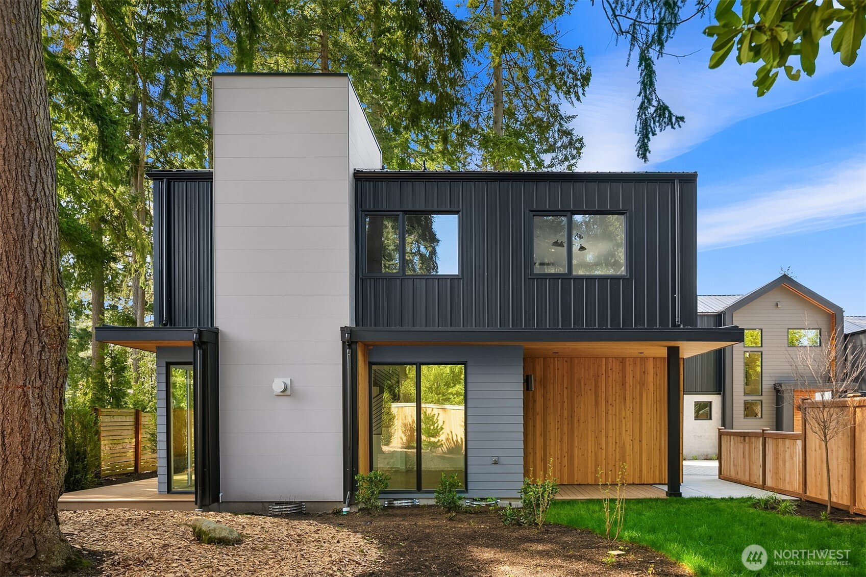 Discover the perfect blend of modern living & comfort in this three-home community nestled in Bridle Trails neighborhood.