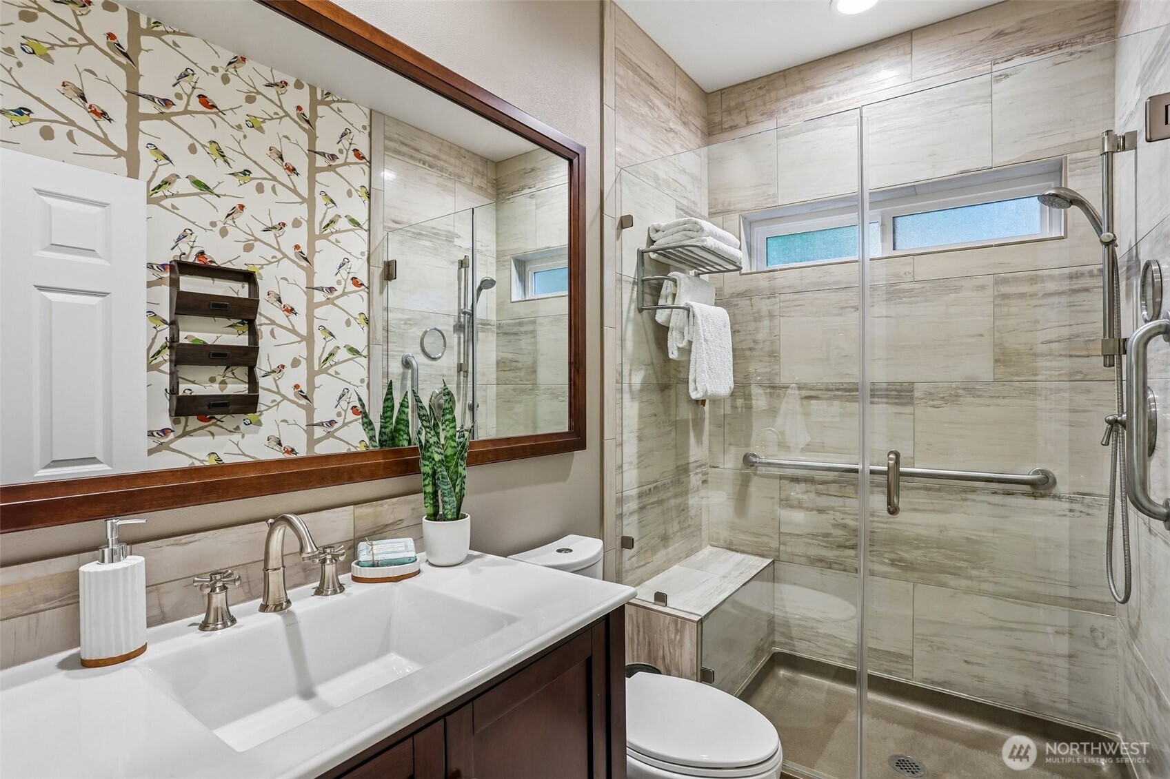 Main Level Guest Suite with backyard patio access,