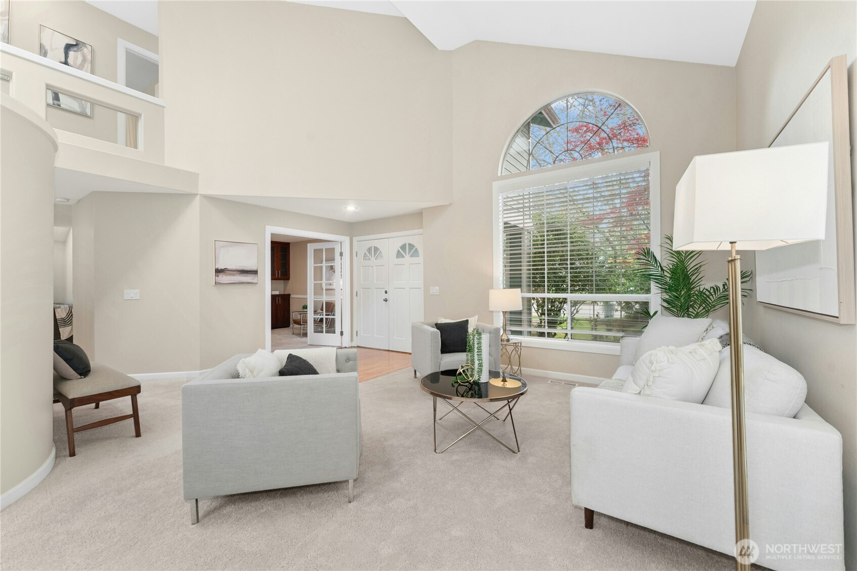 Grand living room offers oversized windows