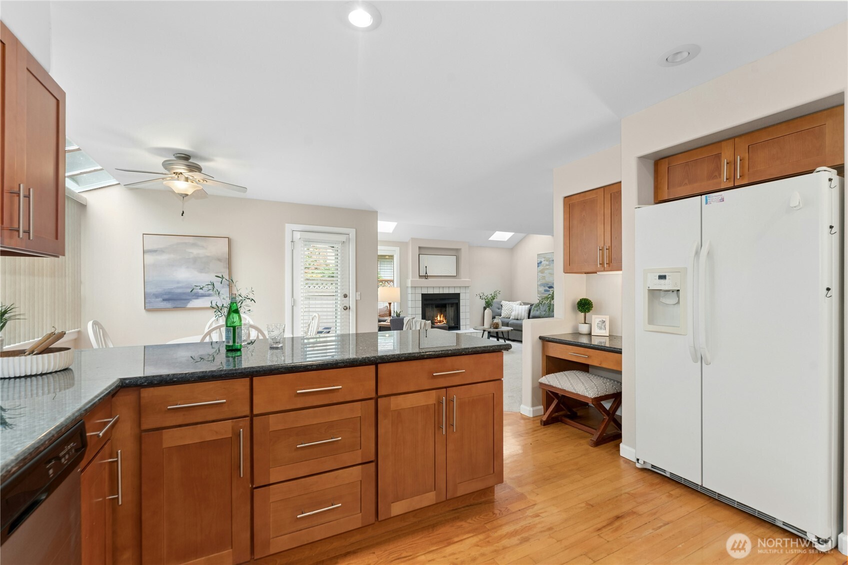 Kitchen opens to breakfast nook and family room