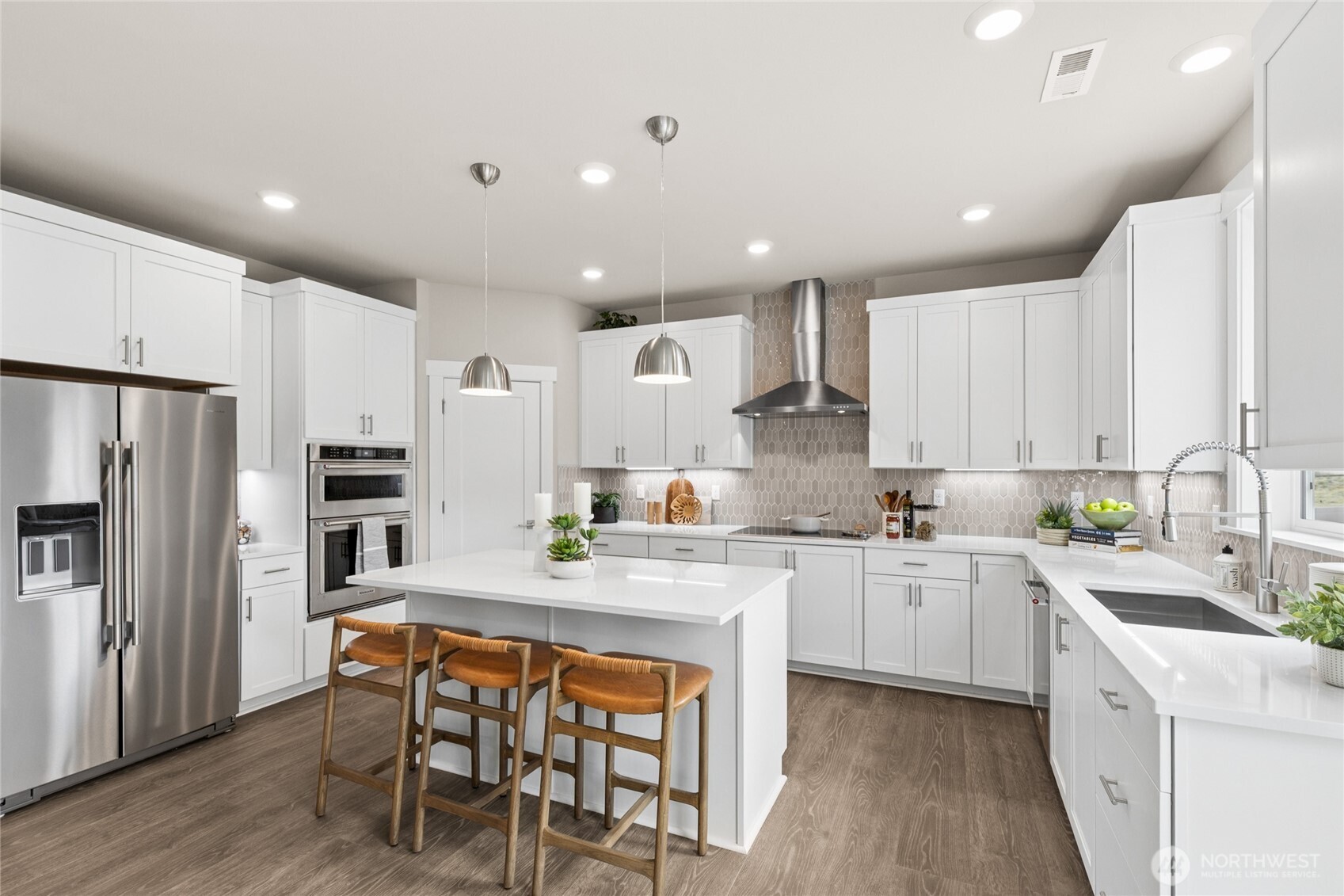 Induction cooking and KitchenAid appliances.