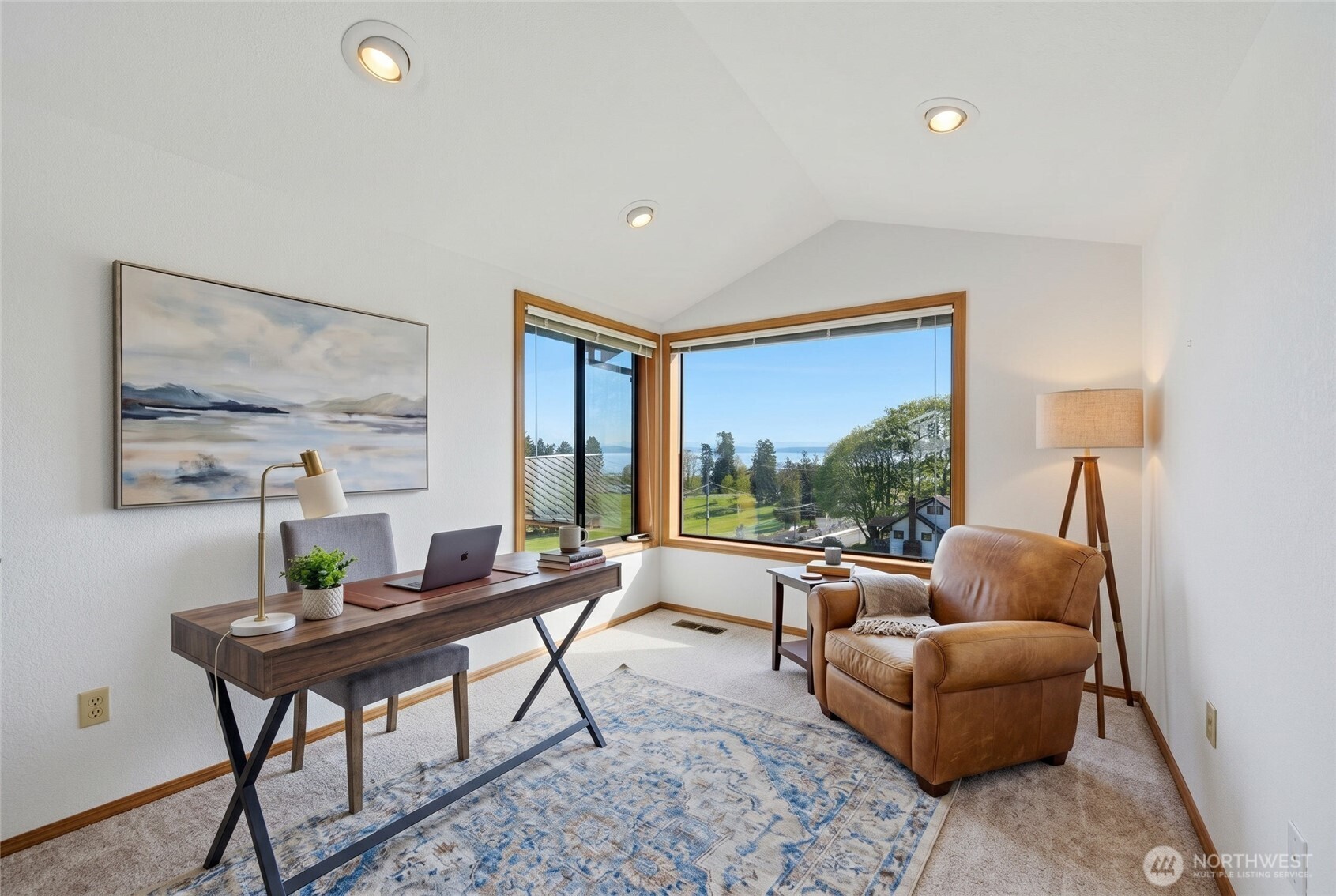 Sitting room at the top of the stairs with a killer view! (This photo is virtually staged).